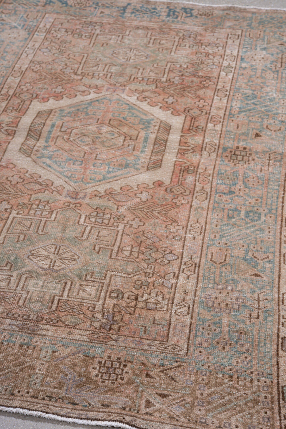 3' x 5' one-of-a-kind handmade antique Karaje small size rug. Color palette: ivory, blush, sky blue, taupe, camel, rose