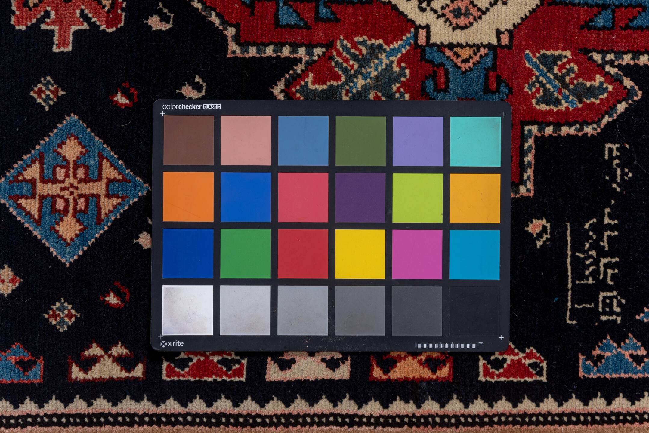 3' x 8' one-of-a-kind handmade vintage Malayer runner rug. Color palette: black, blue, brown, gray, pink, red