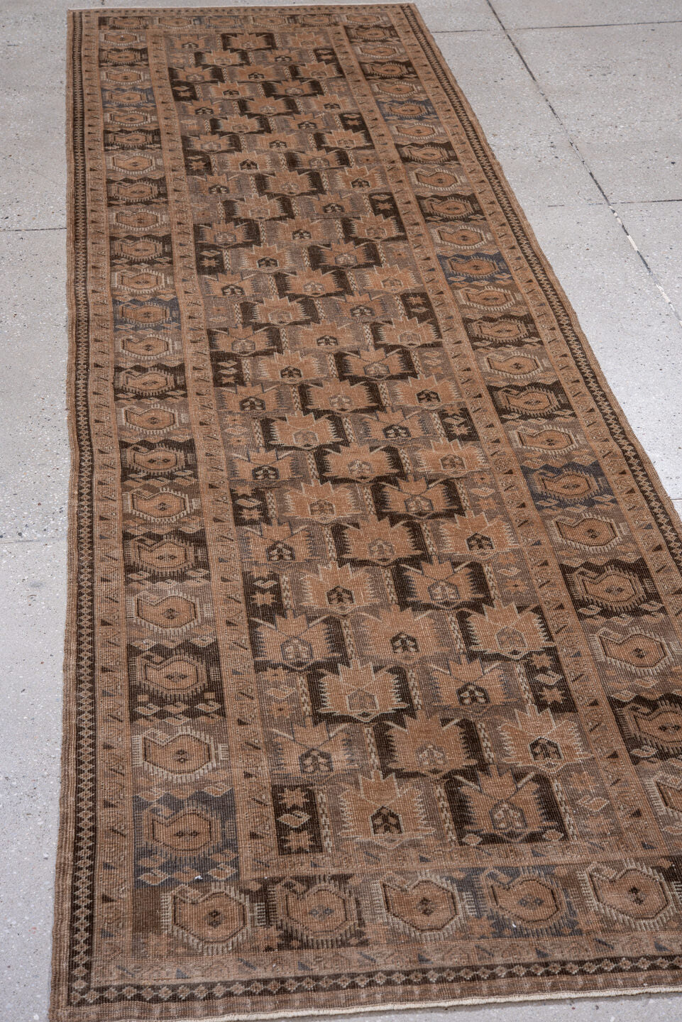 2' x 9' one-of-a-kind handmade antique Belouch runner rug. Color palette: camel, brown, taupe, charcoal, ivory, slate, beige