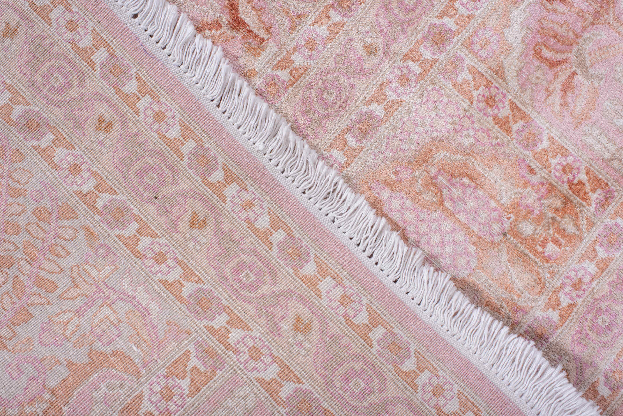 7' x 9' one-of-a-kind handmade antique Kashmir rug. Color palette: ivory, blush, rose, peach, salmon, taupe, pink, red