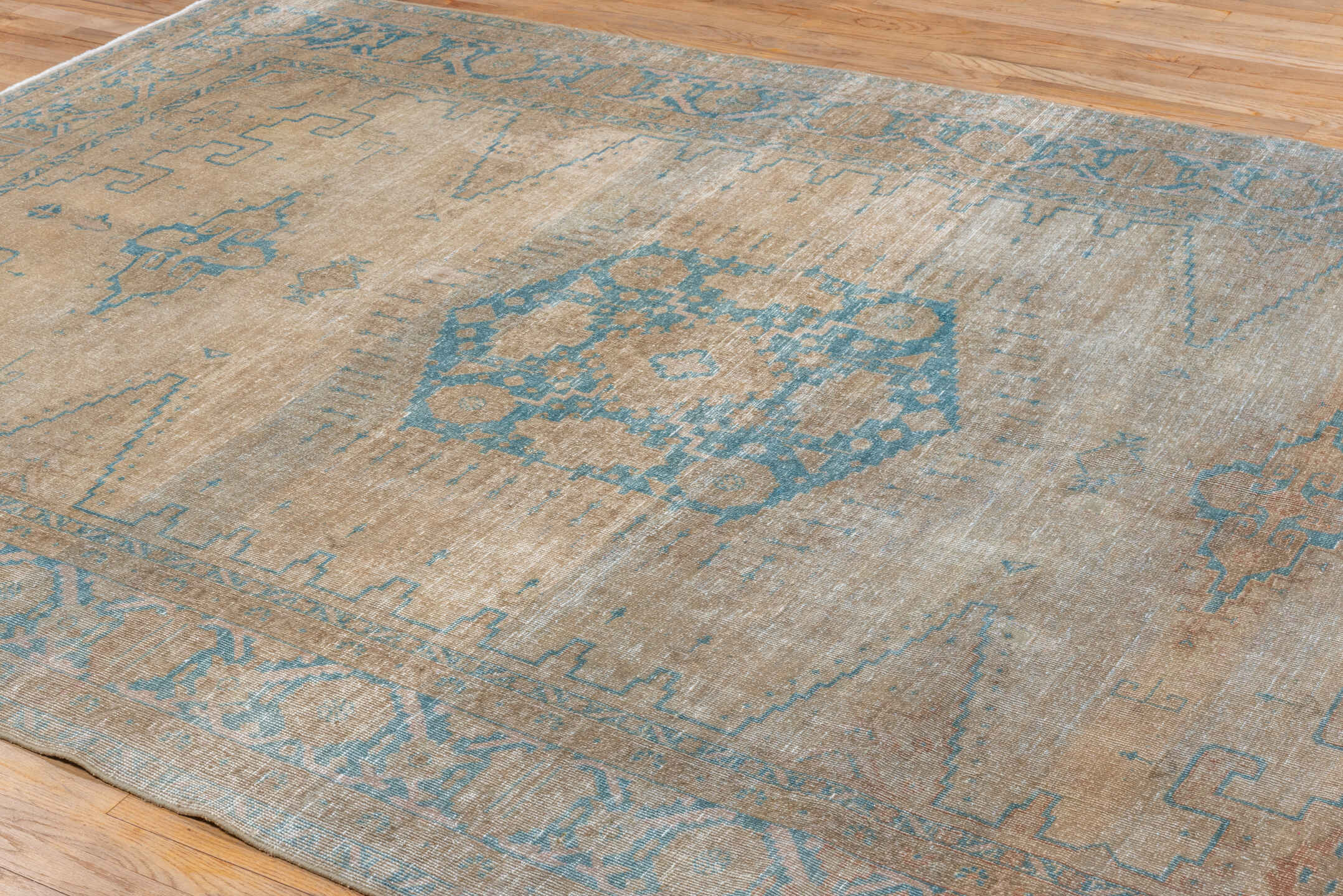 7' x 10' one-of-a-kind handmade antique Veece large size rug. Color palette: beige, sky_blue, taupe, ivory, camel