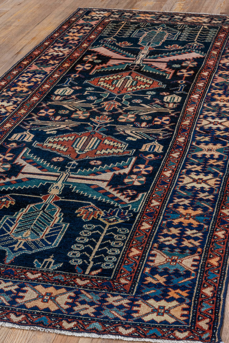 3' x 7' one-of-a-kind handmade vintage Malayer runner rug. Color palette: navy, ivory, rust, teal, camel, crimson, charcoal