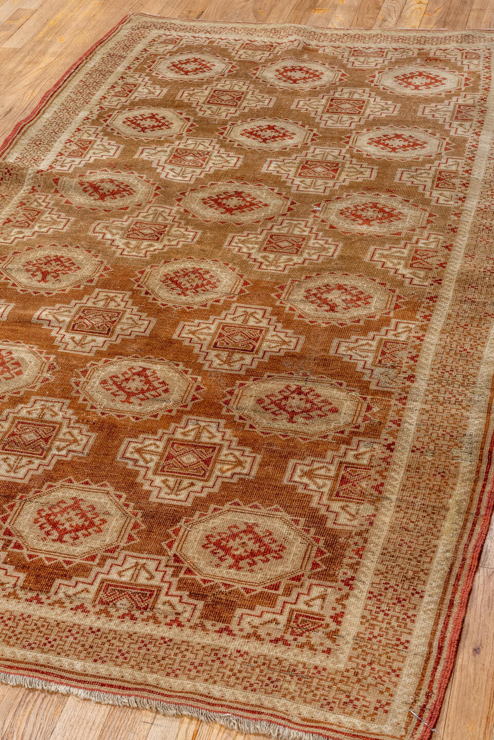 3' x 6' one-of-a-kind handmade antique Belouch rug. Color palette: camel, ivory, rust, terra cotta, tan, sienna, beige