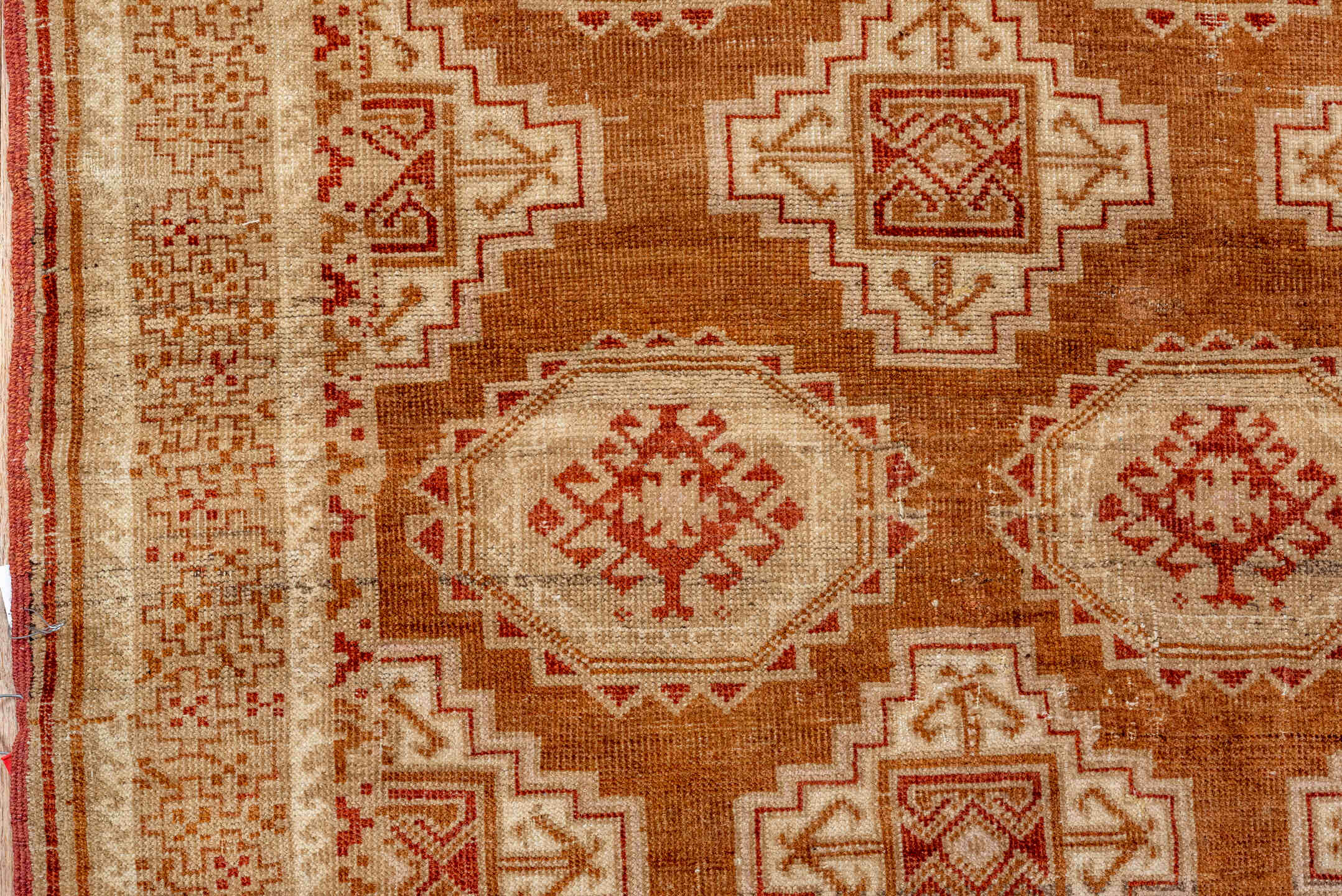 3' x 6' one-of-a-kind handmade antique Belouch rug. Color palette: camel, ivory, rust, terra cotta, tan, sienna, beige