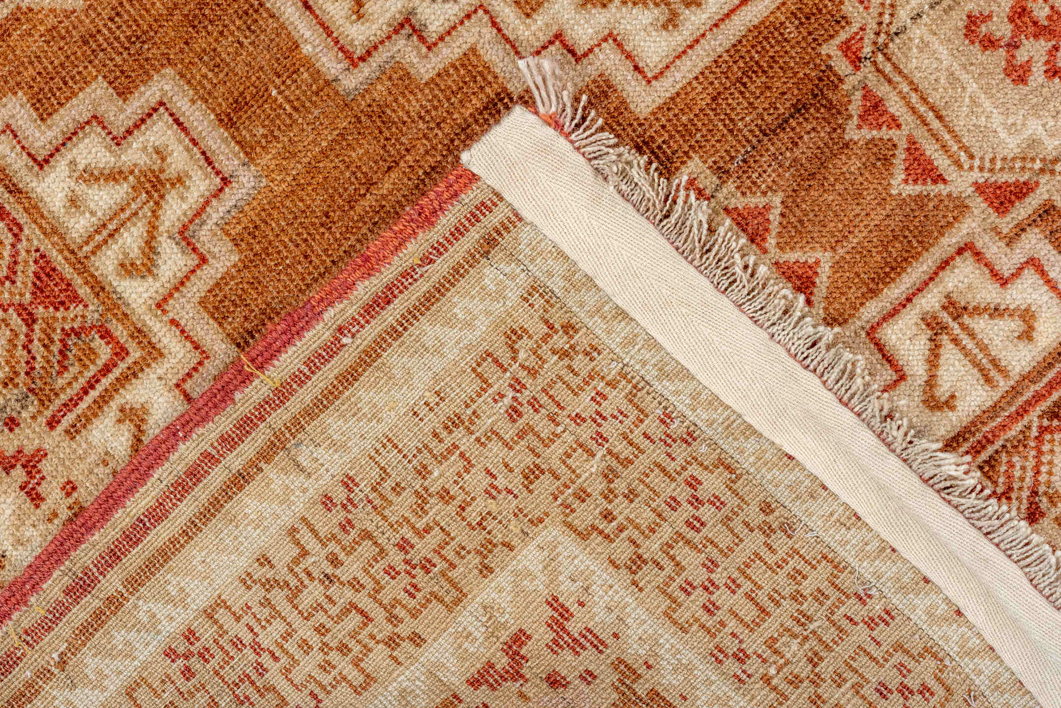 3' x 6' one-of-a-kind handmade antique Belouch rug. Color palette: camel, ivory, rust, terra cotta, tan, sienna, beige
