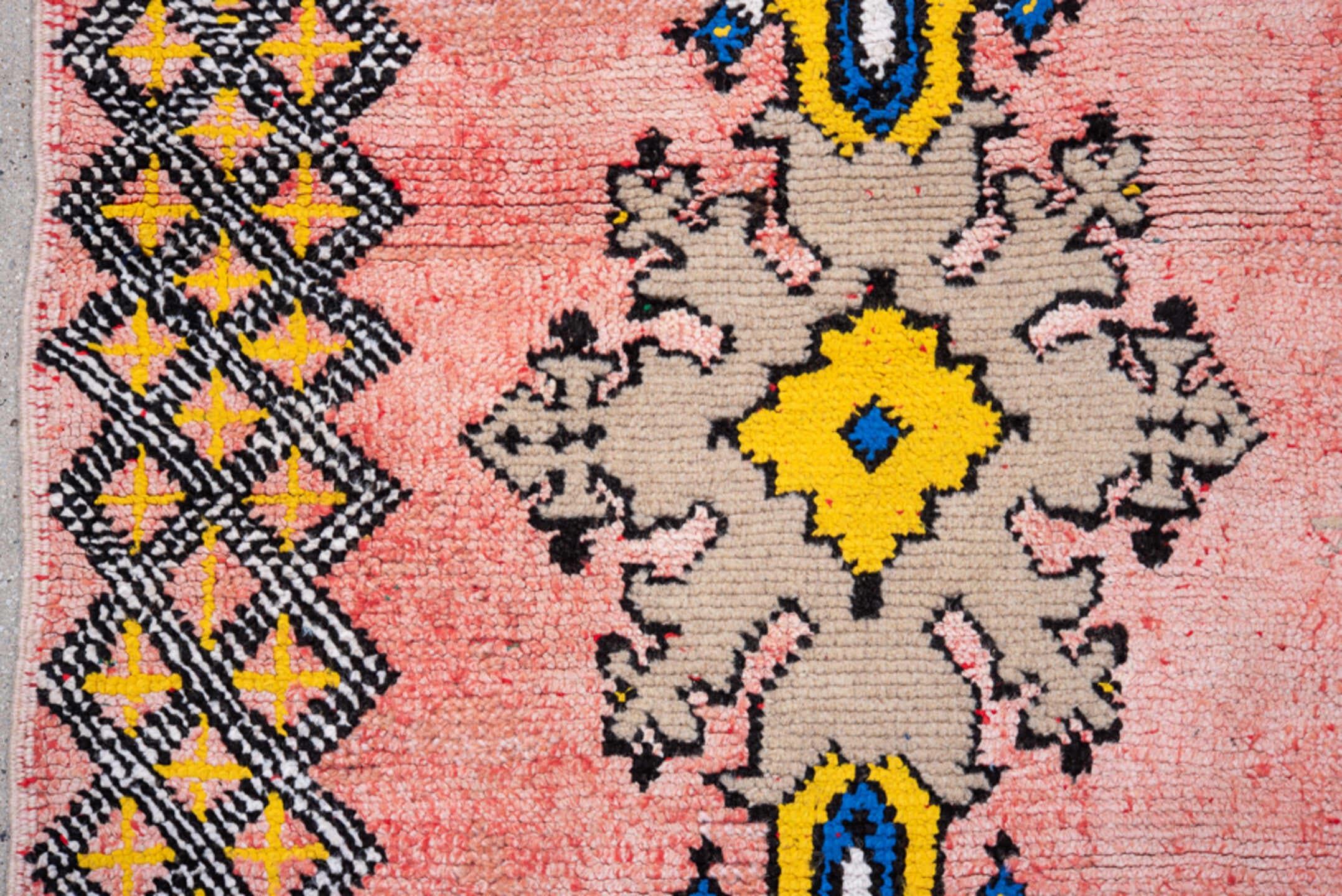 4' x 6' one-of-a-kind handmade vintage Moroccan small size rug. Color palette: pink, yellow, charcoal, taupe, blue, ivory