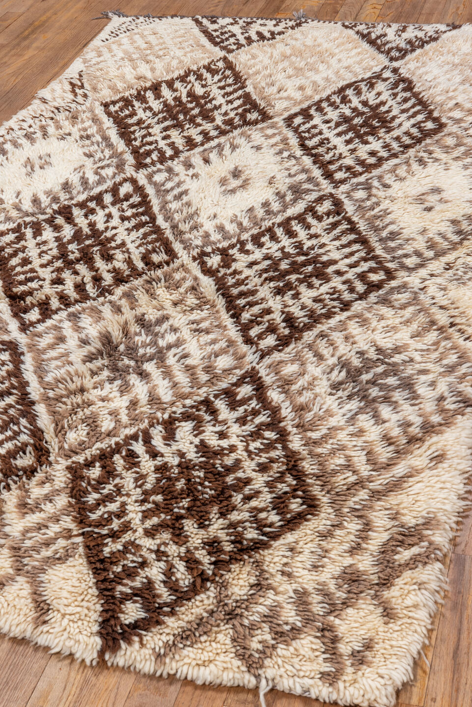 3' x 7' one-of-a-kind handmade vintage Moroccan rug. Color palette: black, brown, gray, light gray, off-white, pink