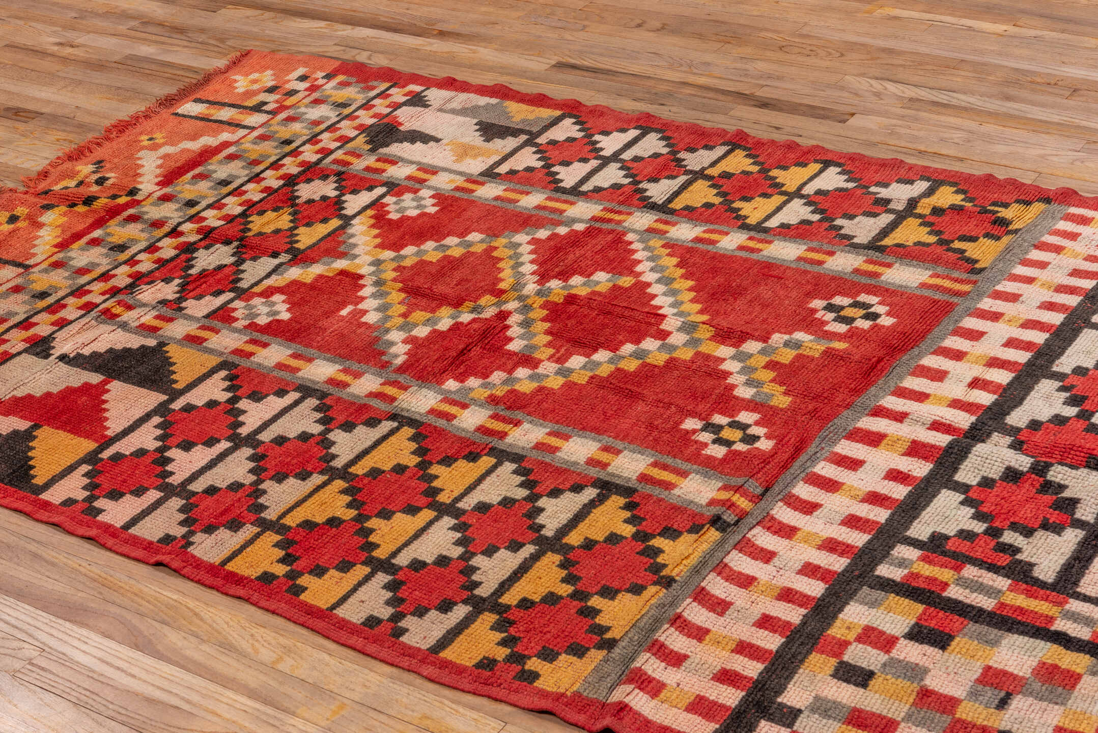 5' x 8' one-of-a-kind handmade vintage Moroccan medium size rug. Color palette: terra cotta, ivory, charcoal, gold, gray