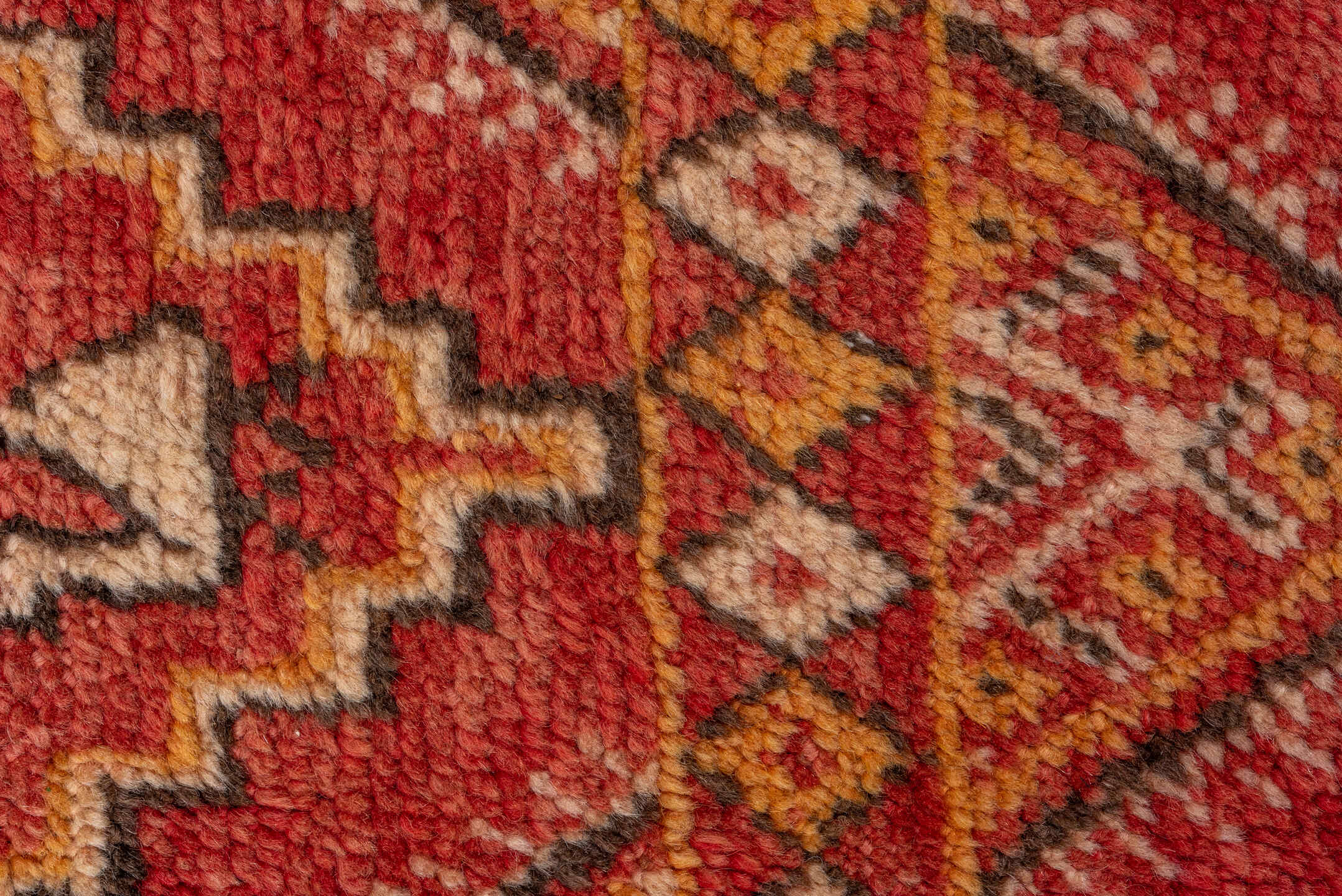 5' x 8' one-of-a-kind handmade vintage Moroccan medium size rug. Color palette: brown, dark red, orange, peru, pink, red