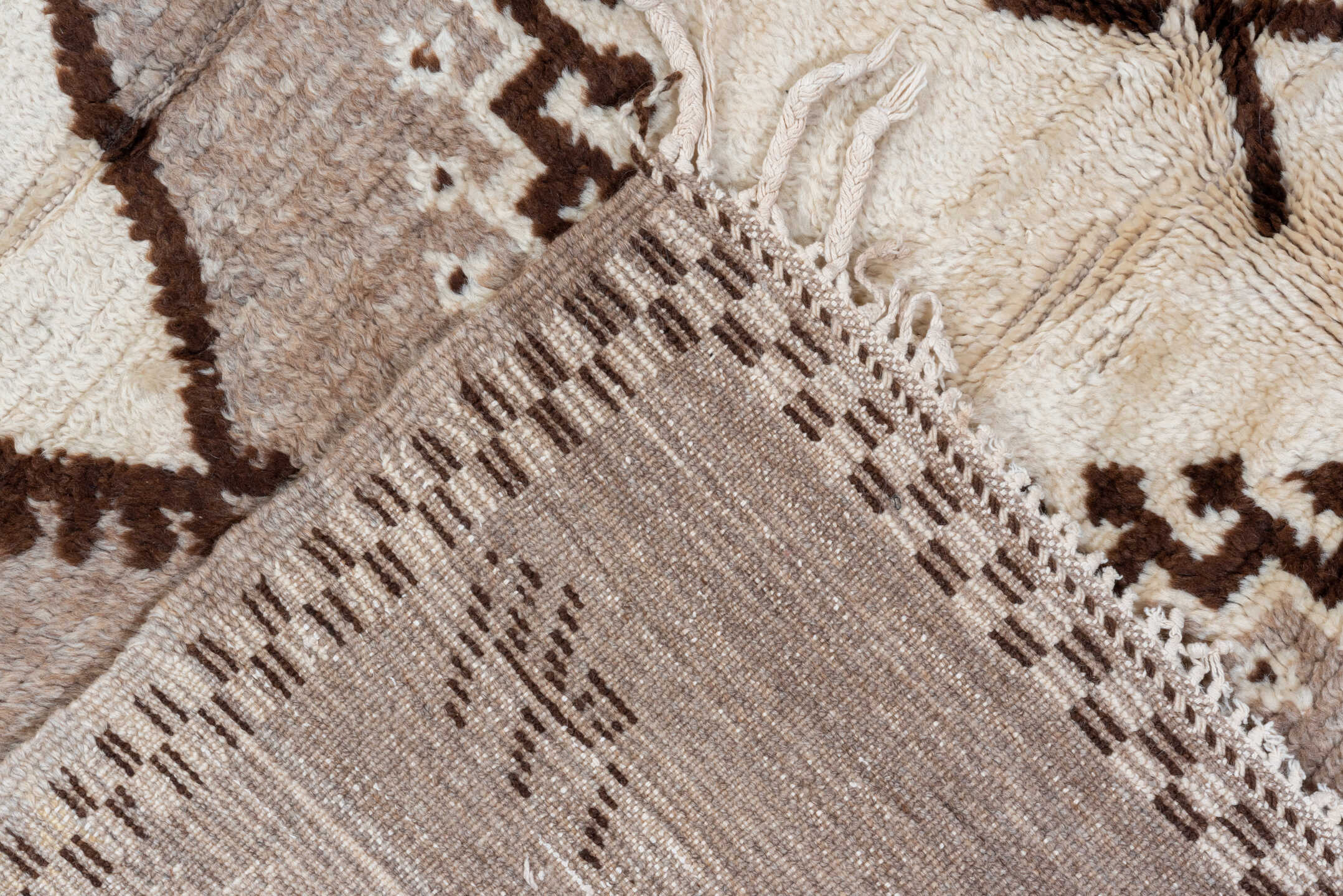 4' x 9' one-of-a-kind handmade vintage Moroccan runner rug. Color palette: black, brown, gray, light gray, off-white, orange