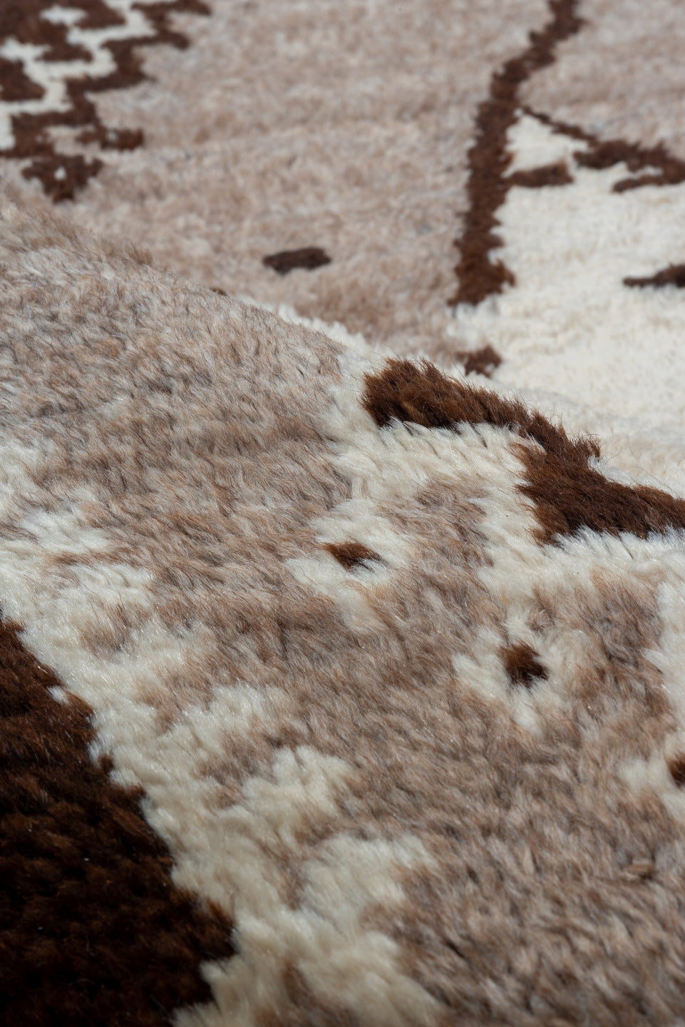 4' x 9' one-of-a-kind handmade vintage Moroccan runner rug. Color palette: black, brown, gray, light gray, off-white, orange