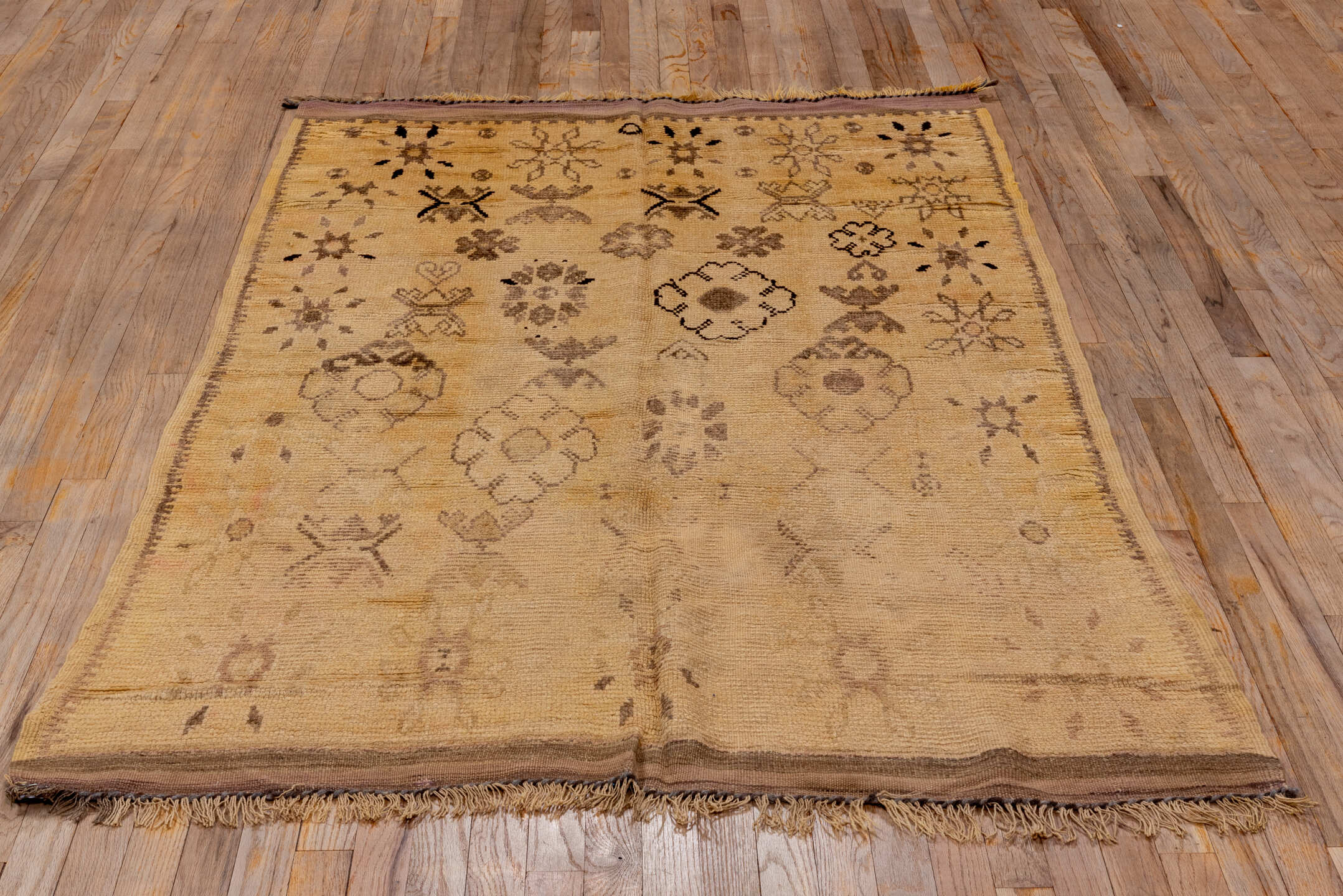 4' x 7' one-of-a-kind handmade vintage Moroccan rug. Color palette: brown, burlywood, off-white, orange, pink, snow, tan