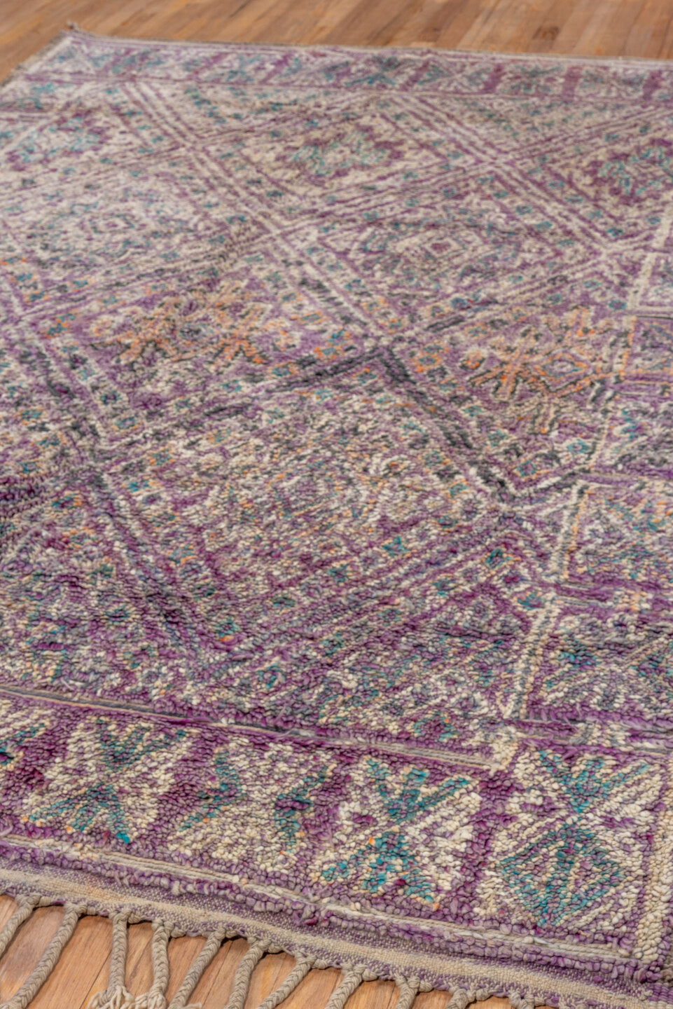 6' x 9' one-of-a-kind handmade vintage Moroccan medium size rug. Color palette: lavender, ivory, taupe, turquoise, rose
