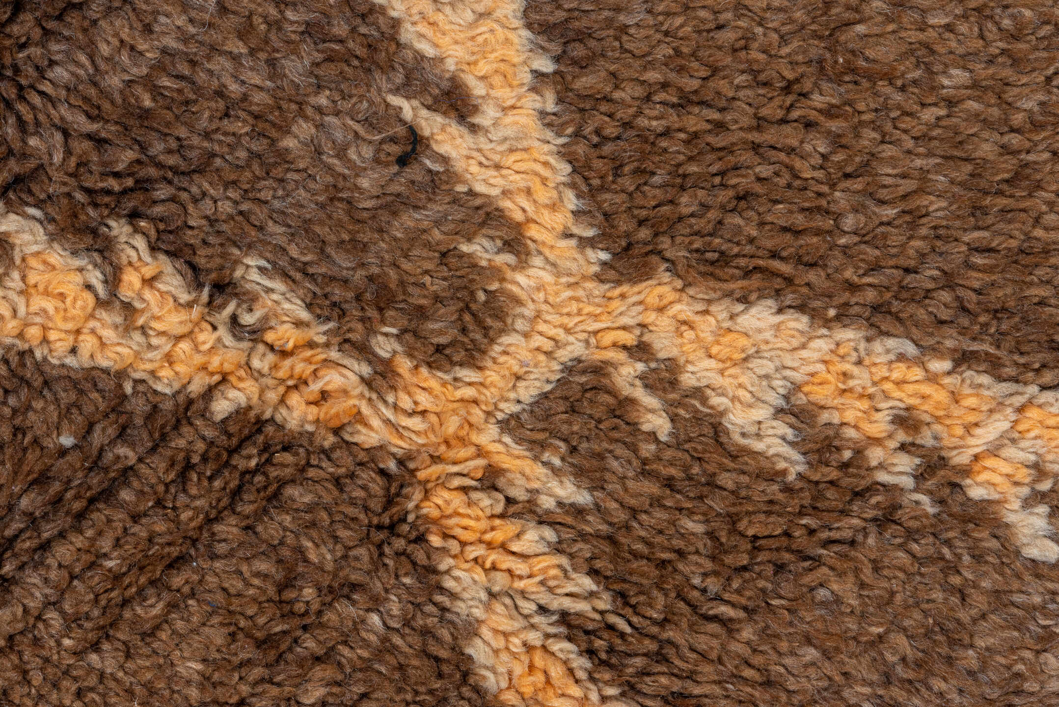 4' x 7' one-of-a-kind handmade vintage Moroccan rug. Color palette: brown, ivory, blush, taupe, charcoal, teal, purple, gold