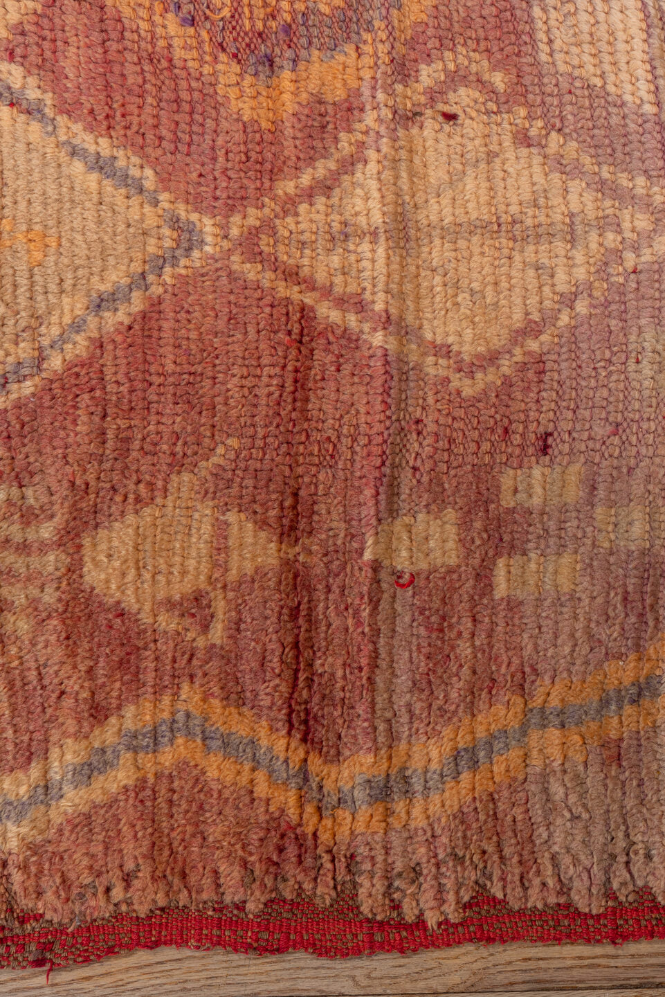 2' x 7' one-of-a-kind handmade vintage Moroccan runner rug. Color palette: brown, orange, pink, red