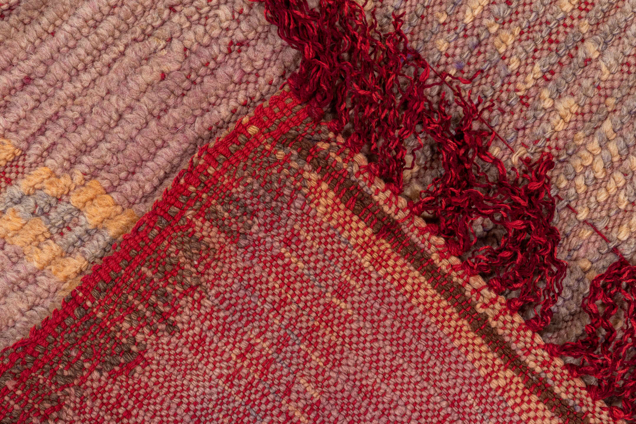 2' x 7' one-of-a-kind handmade vintage Moroccan runner rug. Color palette: brown, orange, pink, red