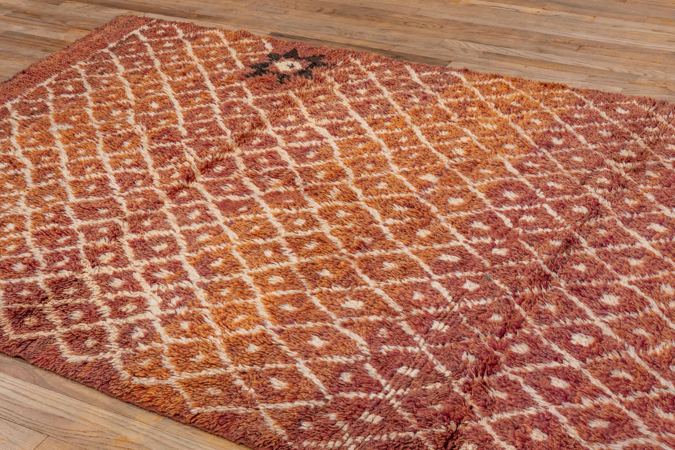 6' x 8' one-of-a-kind handmade antique Moroccan medium size rug. Color palette: terra cotta, ivory, rust, rose, charcoal