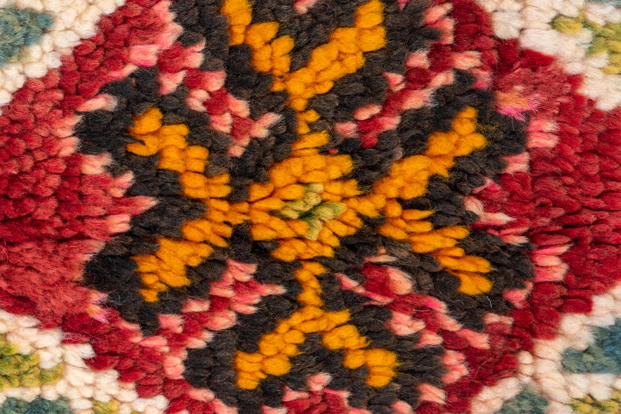6' x 9' one-of-a-kind handmade antique Moroccan medium size rug. Color palette: red, rust, gold, pink, sage, ivory, charcoal