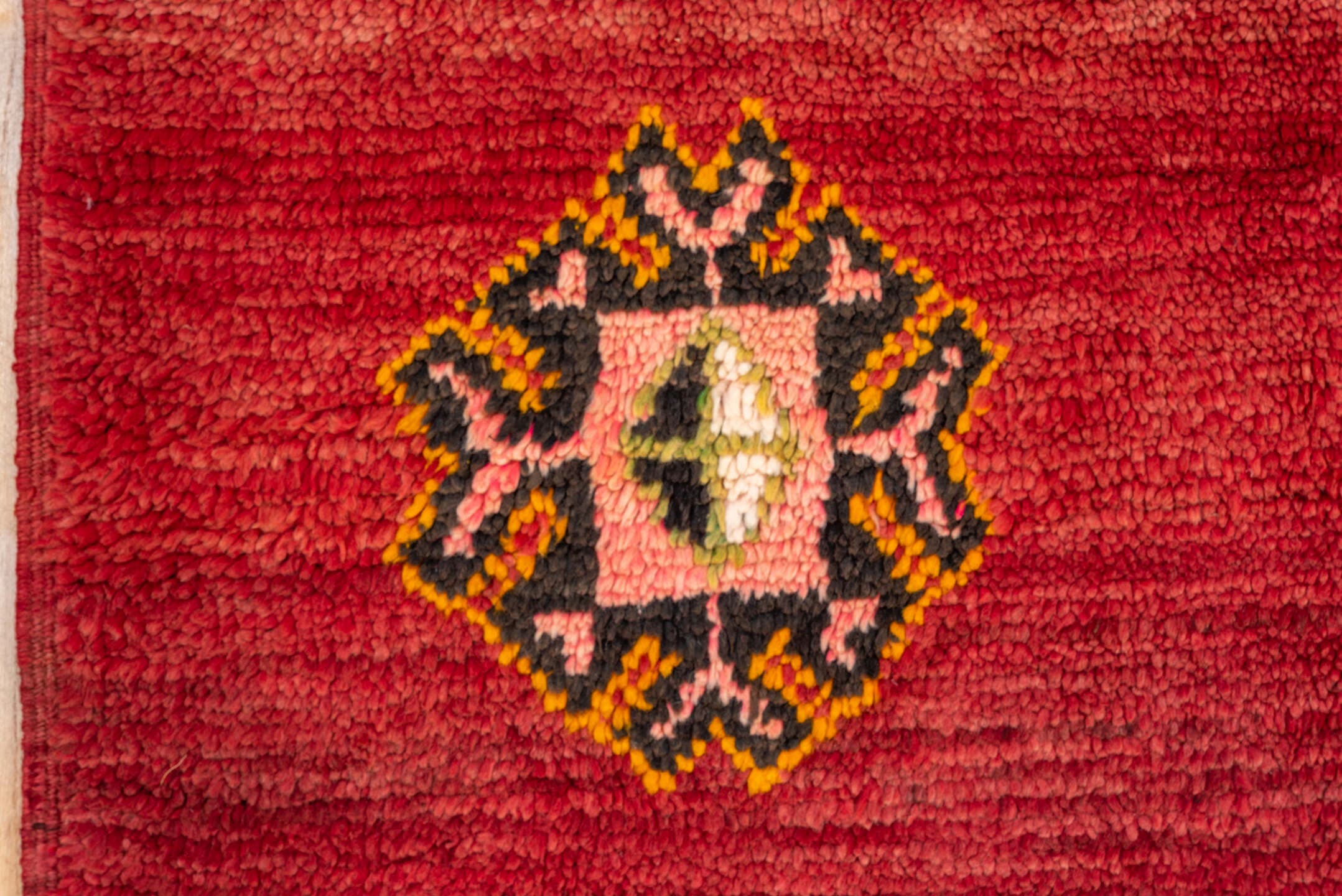 6' x 9' one-of-a-kind handmade antique Moroccan medium size rug. Color palette: red, rust, gold, pink, sage, ivory, charcoal