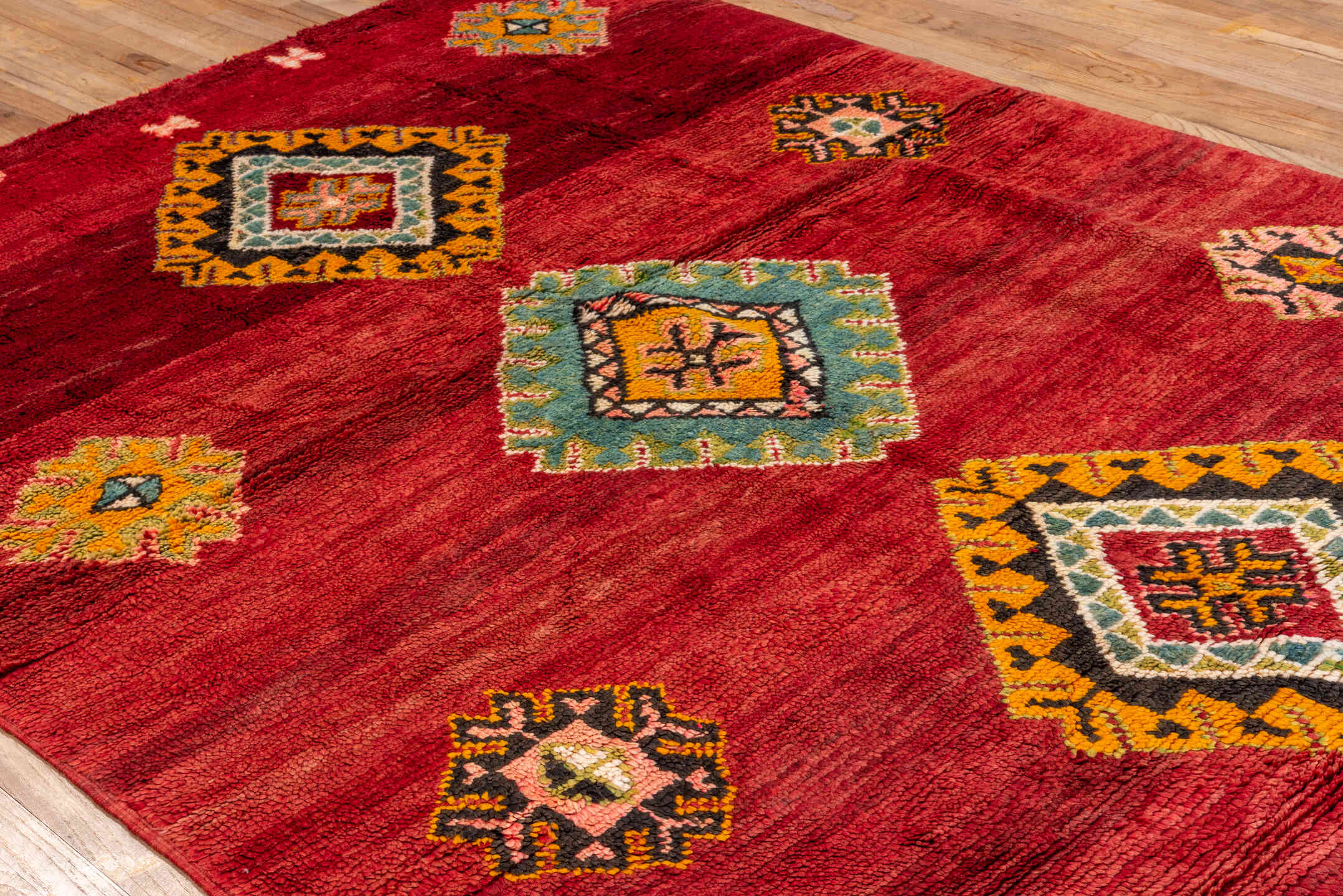 6' x 9' one-of-a-kind handmade antique Moroccan medium size rug. Color palette: red, rust, gold, pink, sage, ivory, charcoal