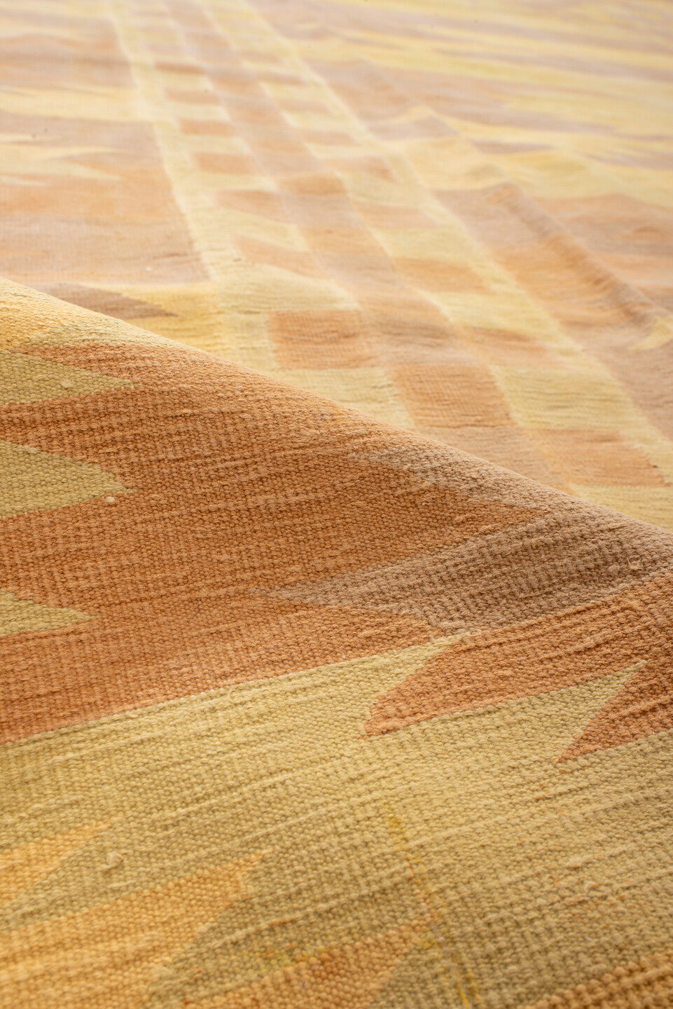 9' x 16' one-of-a-kind handmade antique Dhurrie rug. Color palette: gold, butter yellow, peach, terra cotta, camel