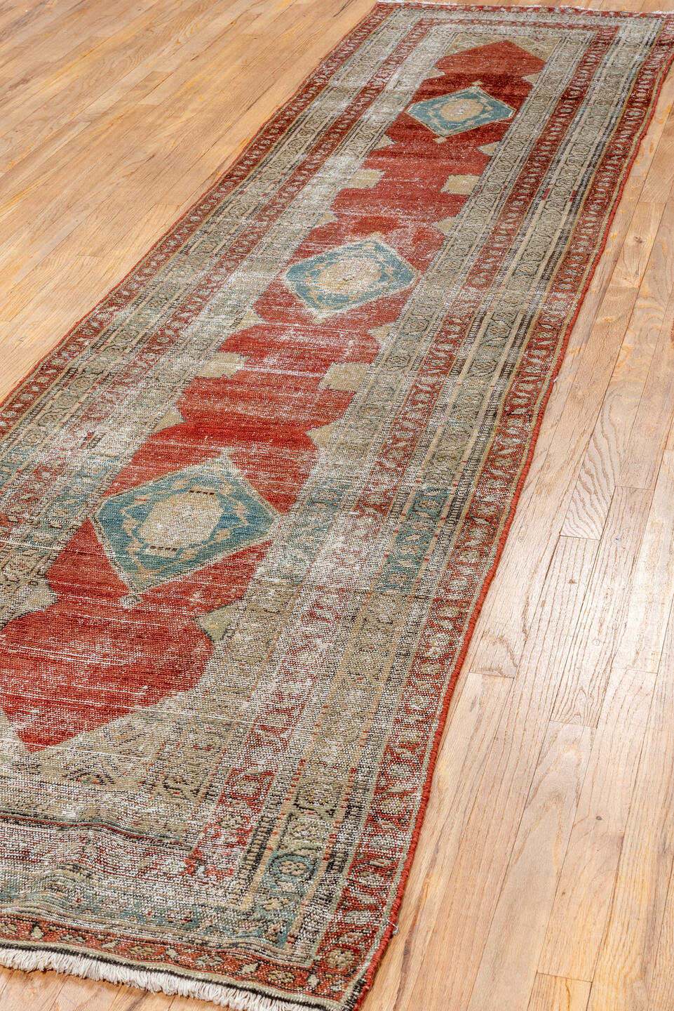 2' x 11' one-of-a-kind handmade antique Malayer runner rug. Color palette: rust, ivory, sky_blue, beige, camel, taupe