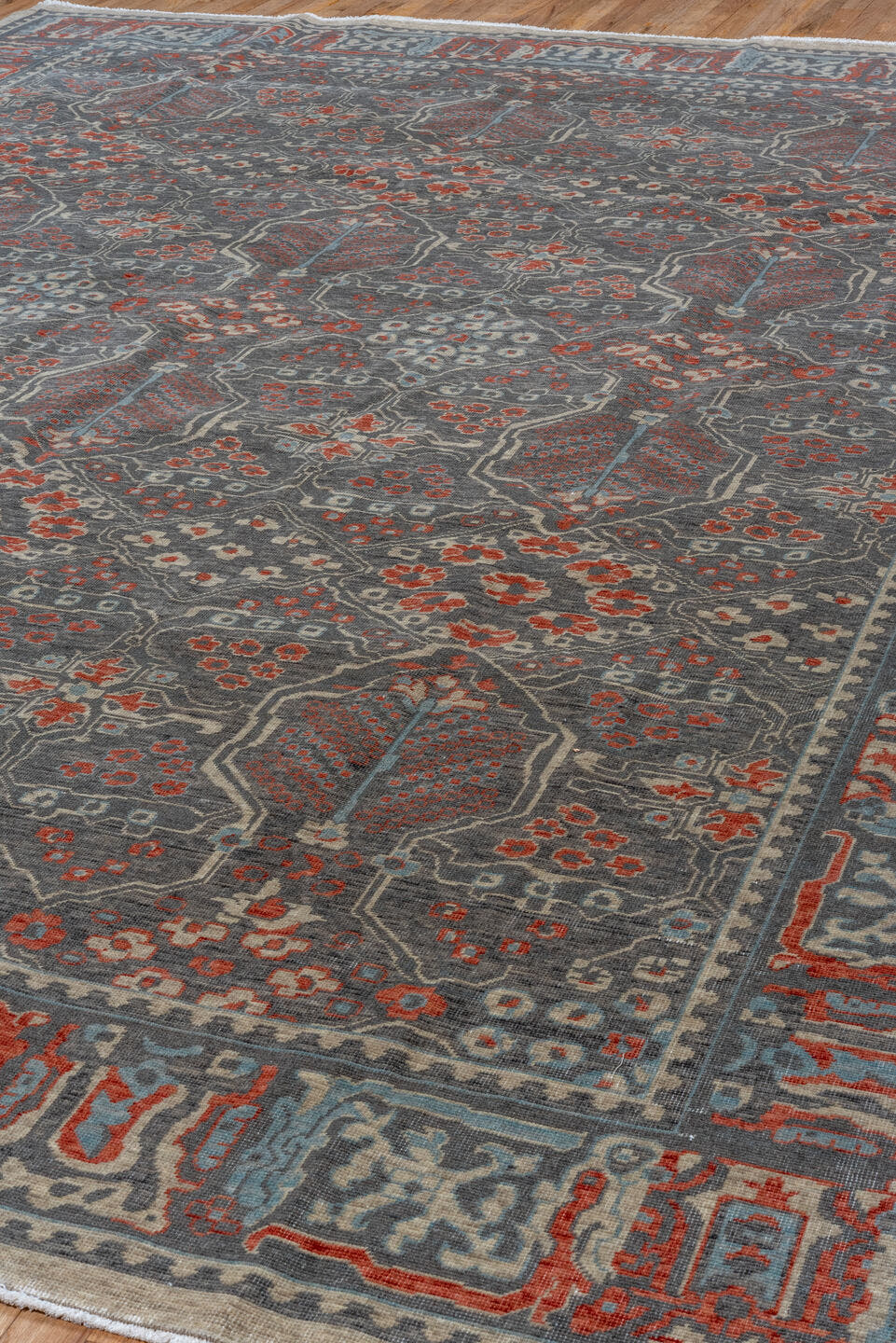 9' x 12' one-of-a-kind handmade machine-made Machine large size rug. Color palette: slate, rust, ivory, blue, taupe