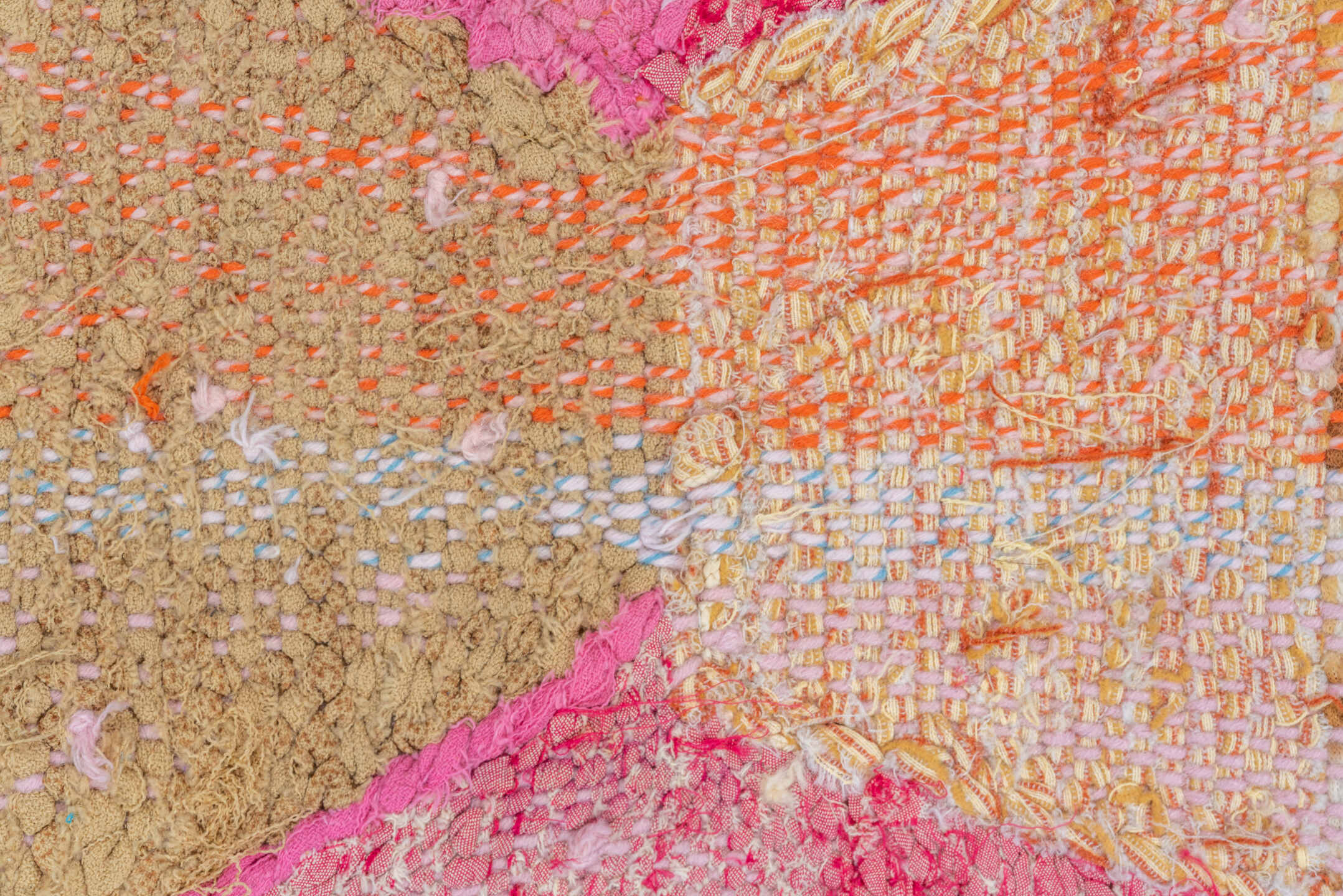 4' x 8' one-of-a-kind handmade vintage Rag Rug rug. Color palette: ivory, pink, tan, charcoal, sky_blue, taupe, orange