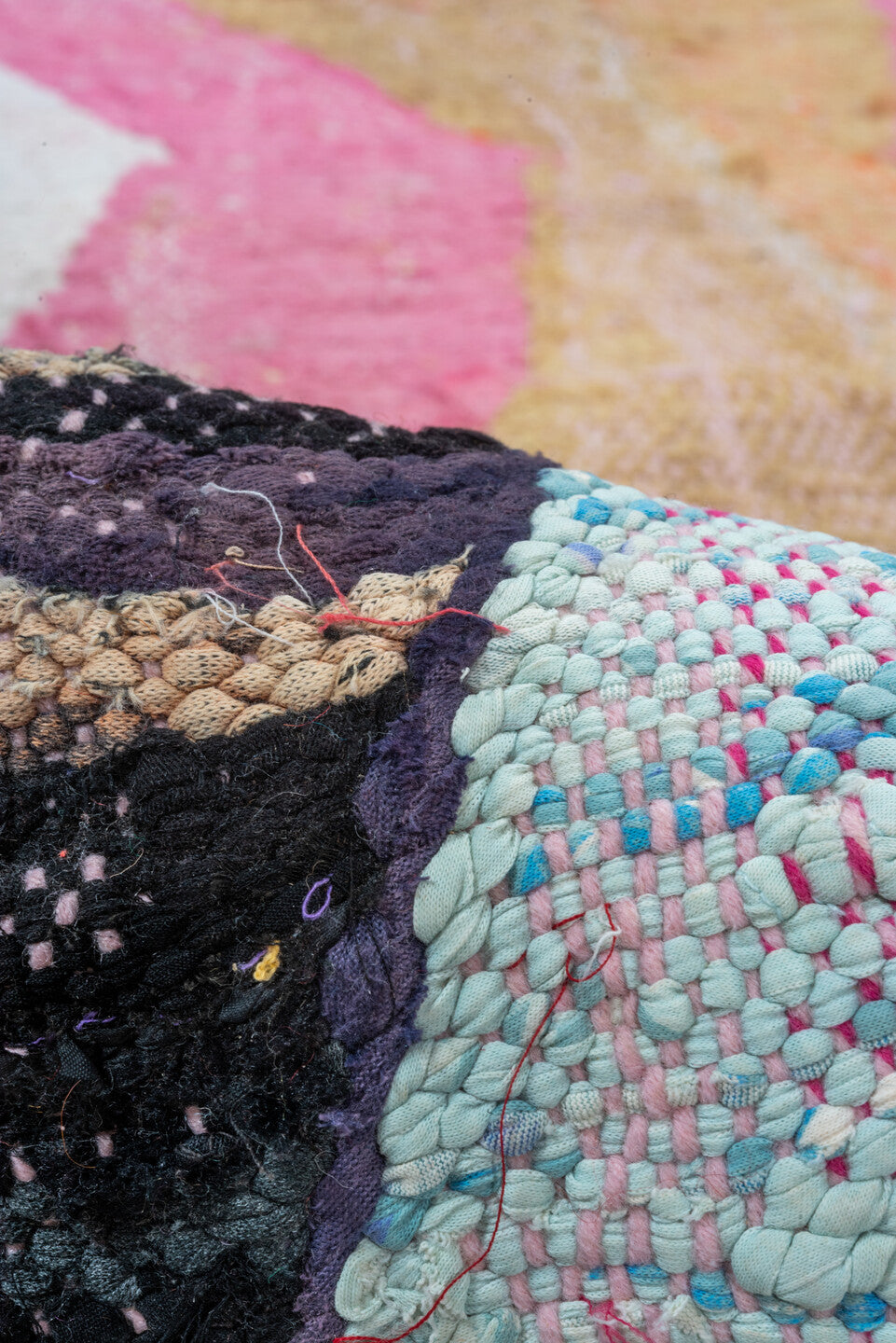 4' x 8' one-of-a-kind handmade vintage Rag Rug rug. Color palette: ivory, pink, tan, charcoal, sky_blue, taupe, orange