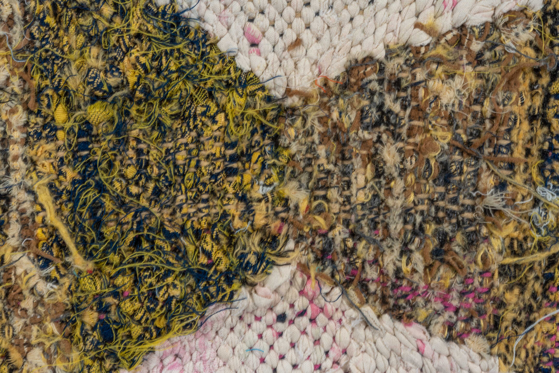 4' x 8' one-of-a-kind handmade vintage Rag Rug runner rug. Color palette: ivory, black, sky_blue, pink, yellow, rust, brown