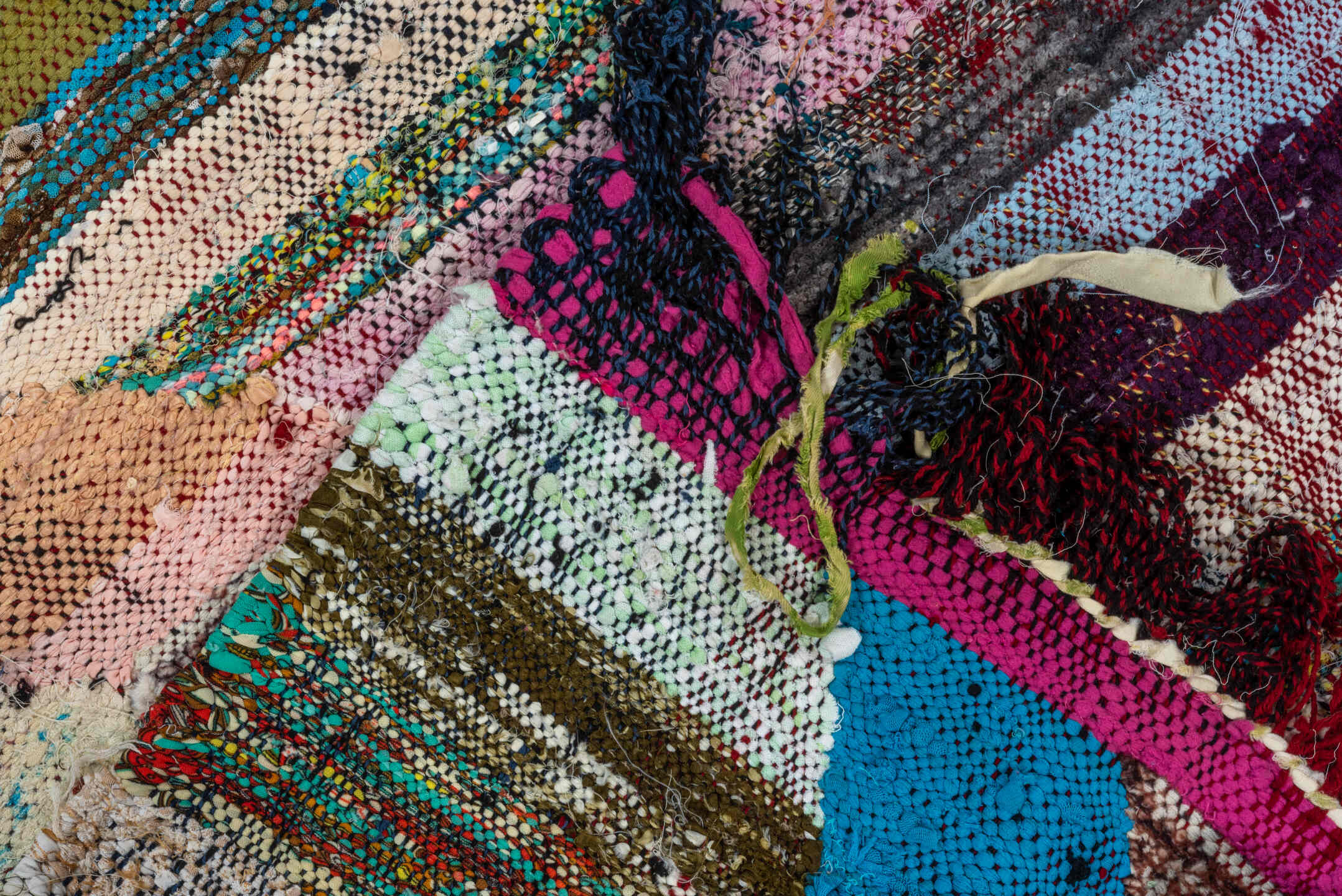 4' x 8' one-of-a-kind handmade vintage Rag Rug rug. Color palette: blush, turquoise, ivory, magenta, brown, aqua, olive