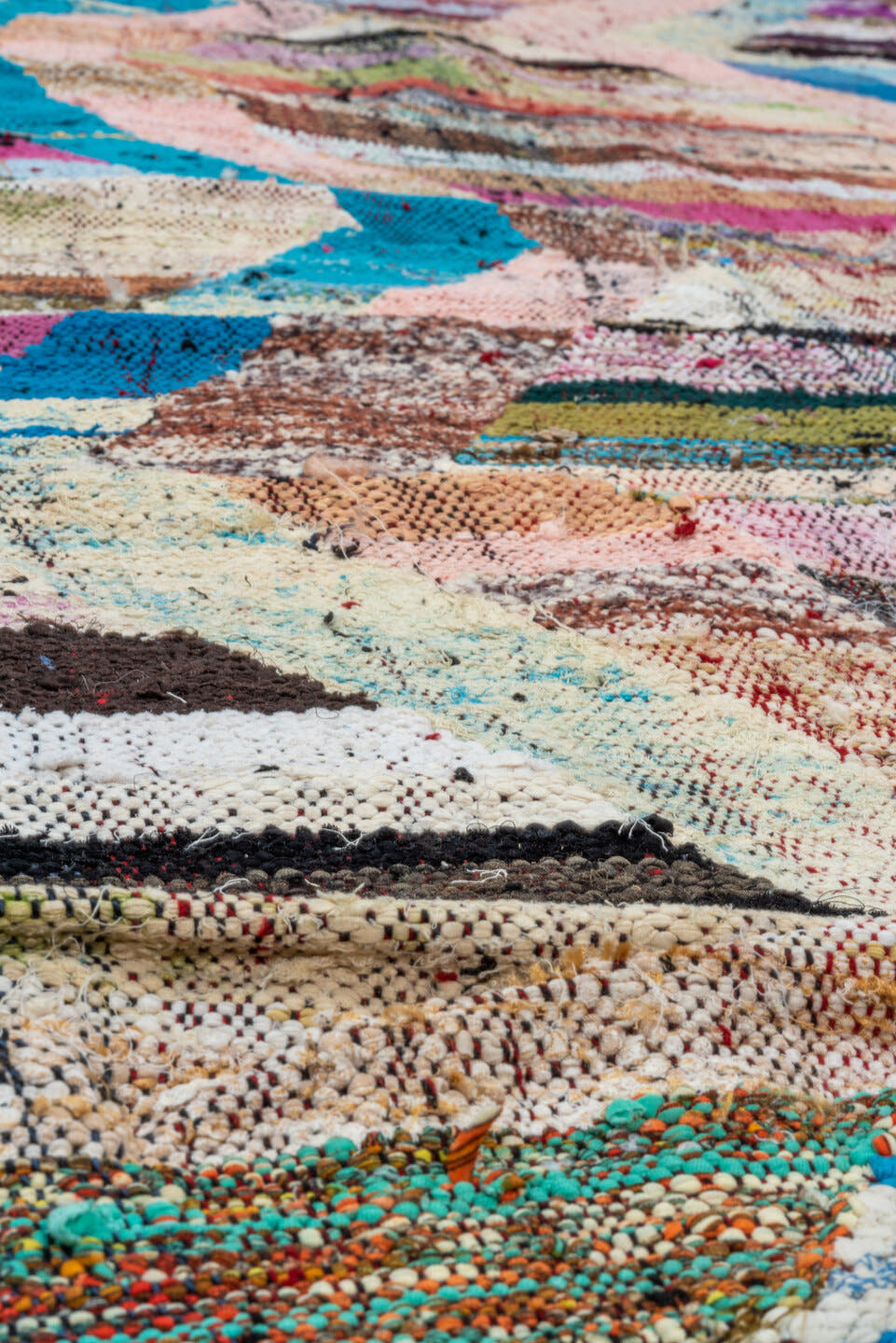 4' x 8' one-of-a-kind handmade vintage Rag Rug rug. Color palette: blush, turquoise, ivory, magenta, brown, aqua, olive