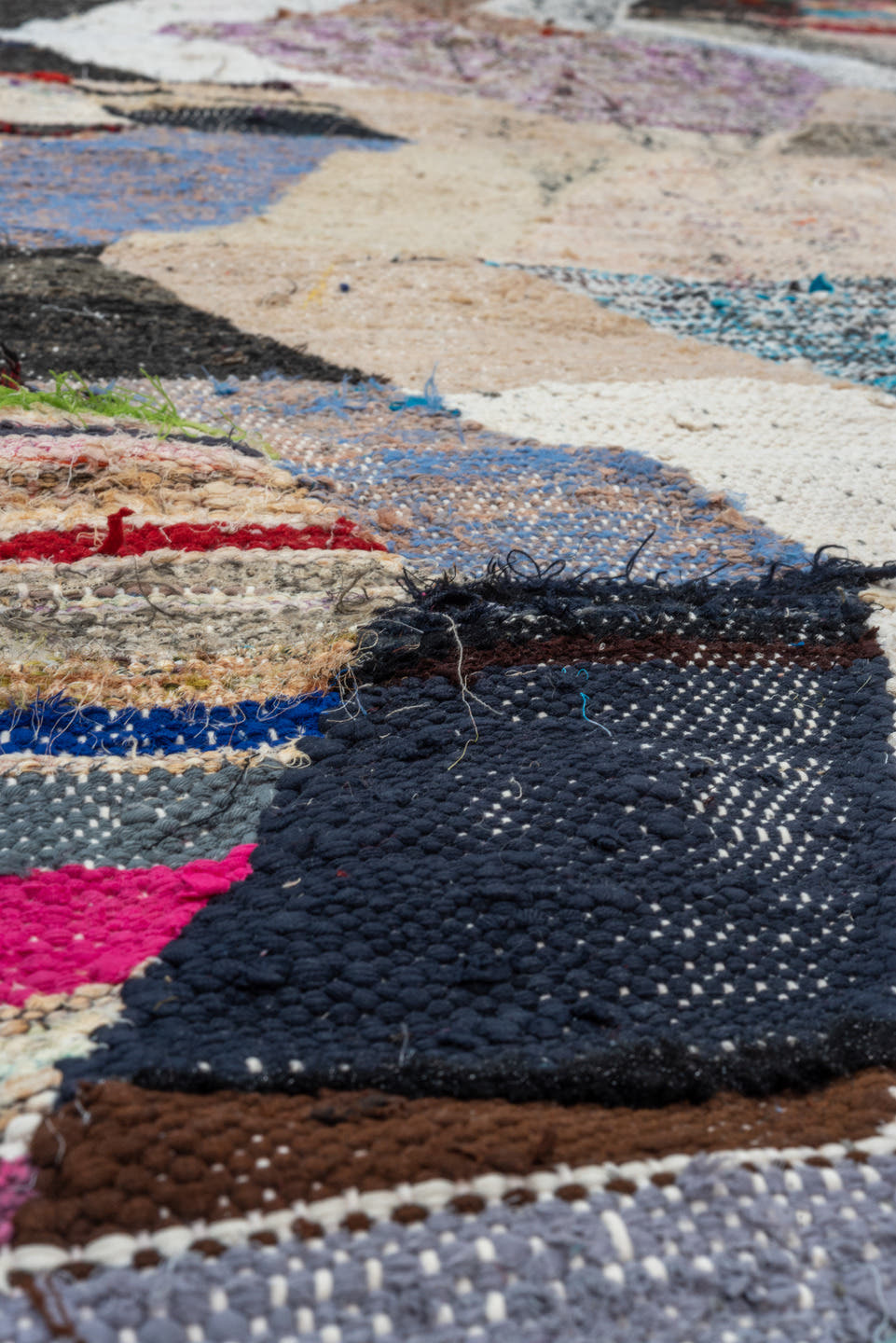 4' x 8' one-of-a-kind handmade vintage Rag Rug rug. Color palette: ivory, taupe, charcoal, cream, turquoise, lavender, green