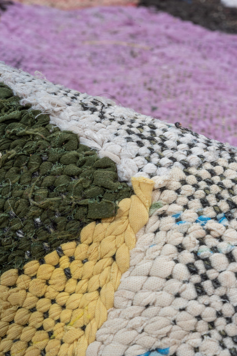 4' x 8' one-of-a-kind handmade vintage Rag Rug rug. Color palette: ivory, black, lavender, turquoise, blush, olive, ochre