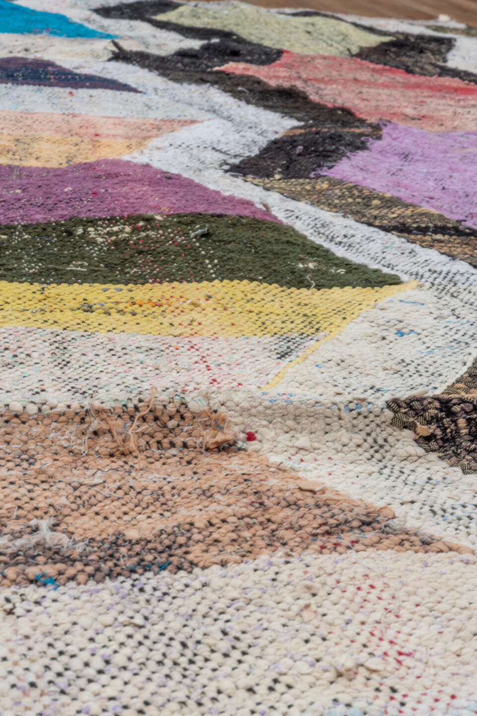 4' x 8' one-of-a-kind handmade vintage Rag Rug rug. Color palette: ivory, black, lavender, turquoise, blush, olive, ochre