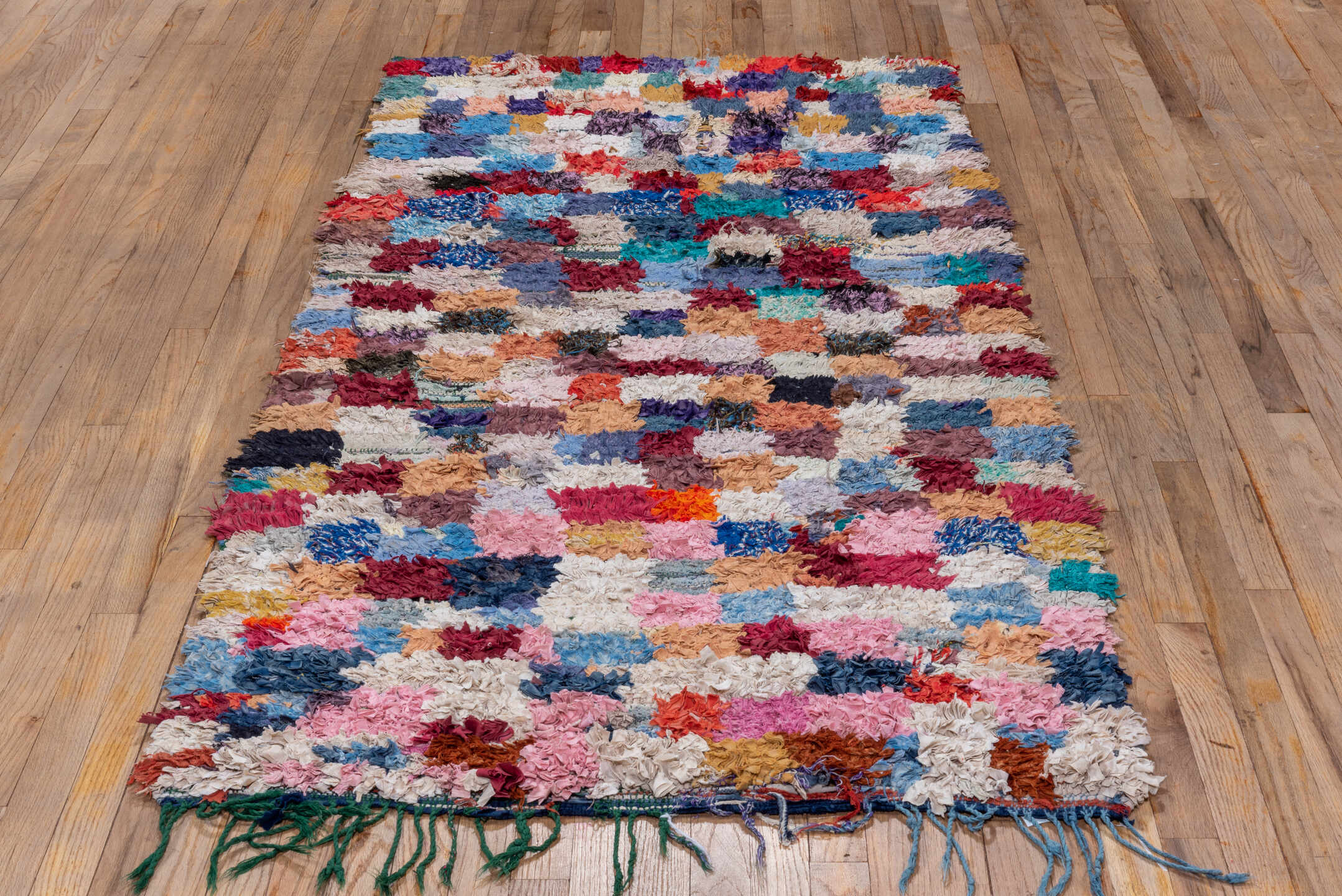 3' x 7' one-of-a-kind handmade vintage Rag Rug runner rug. Color palette: ivory, blush, denim, crimson, lavender, sky_blue
