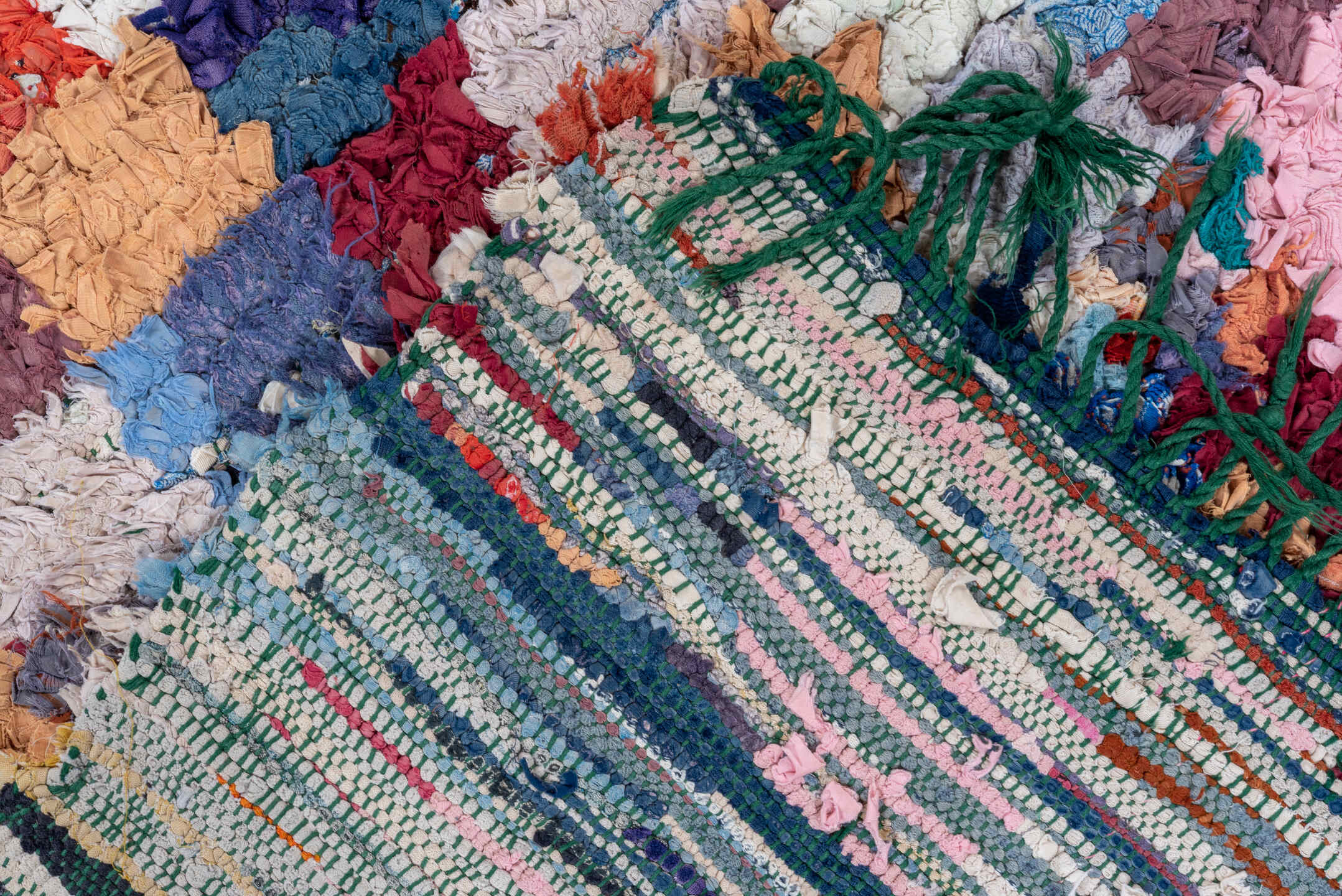 3' x 7' one-of-a-kind handmade vintage Rag Rug runner rug. Color palette: black, blue, brown, gray, green, light blue