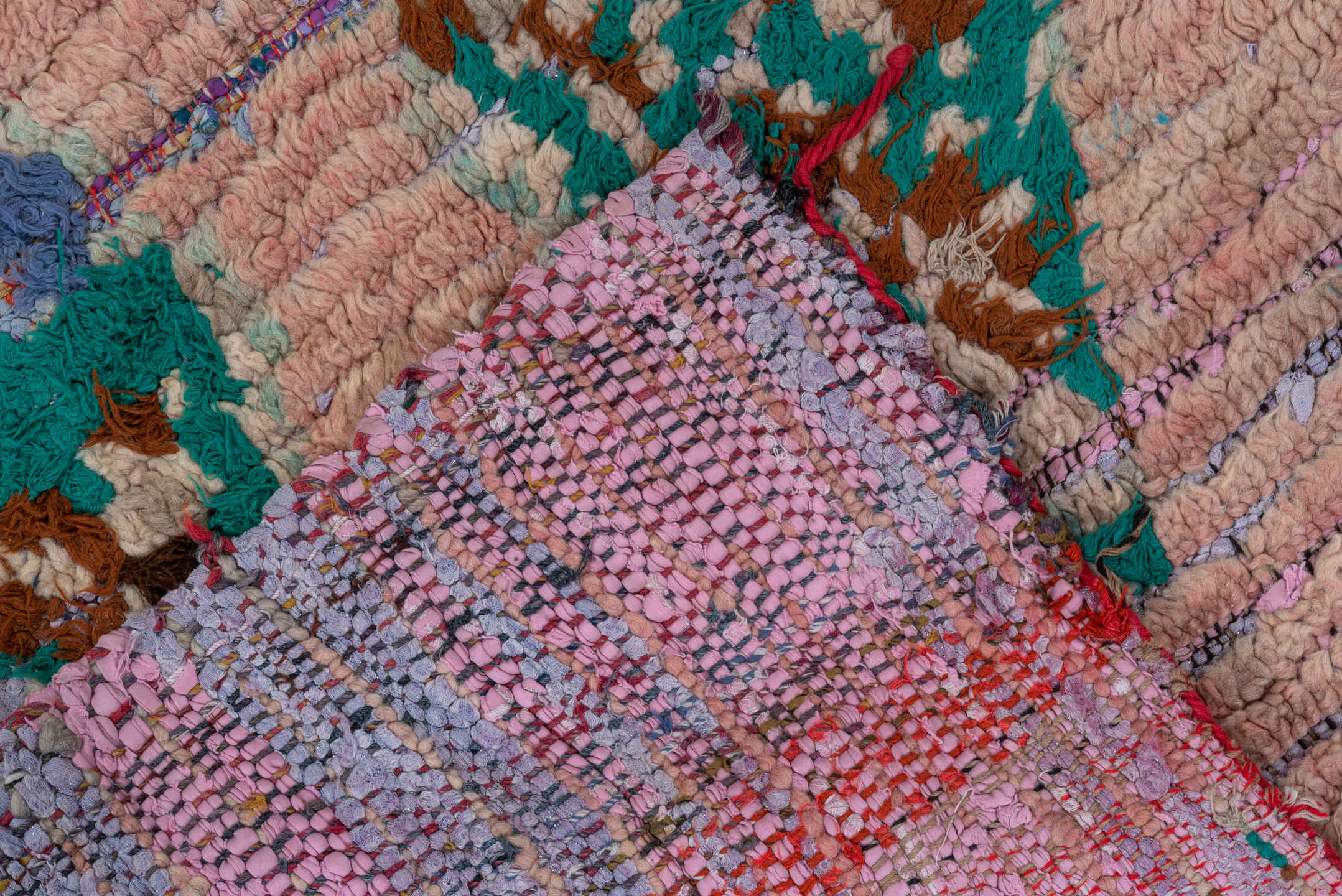 2' x 6' one-of-a-kind handmade vintage Rag Rug runner rug. Color palette: blue, brown, gray, green, pink, redwood