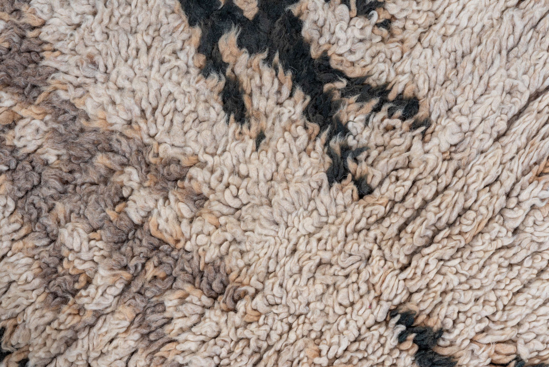 2' x 7' one-of-a-kind handmade vintage Moroccan runner rug. Color palette: black, brown, gray, light gray, off-white, pink