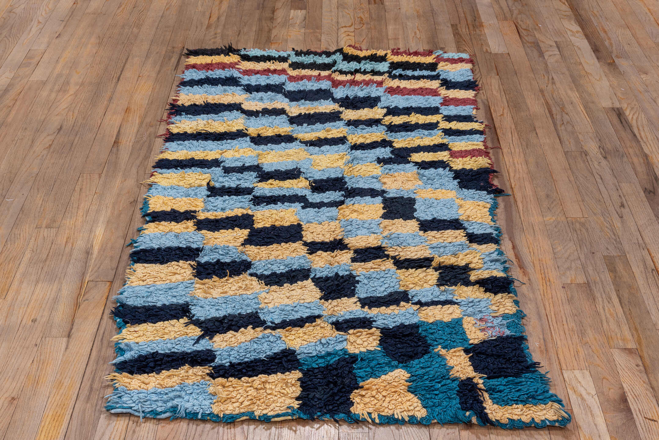 3' x 6' one-of-a-kind handmade vintage Rag Rug runner rug. Color palette: light blue, cream, navy, teal, rust, black, ivory