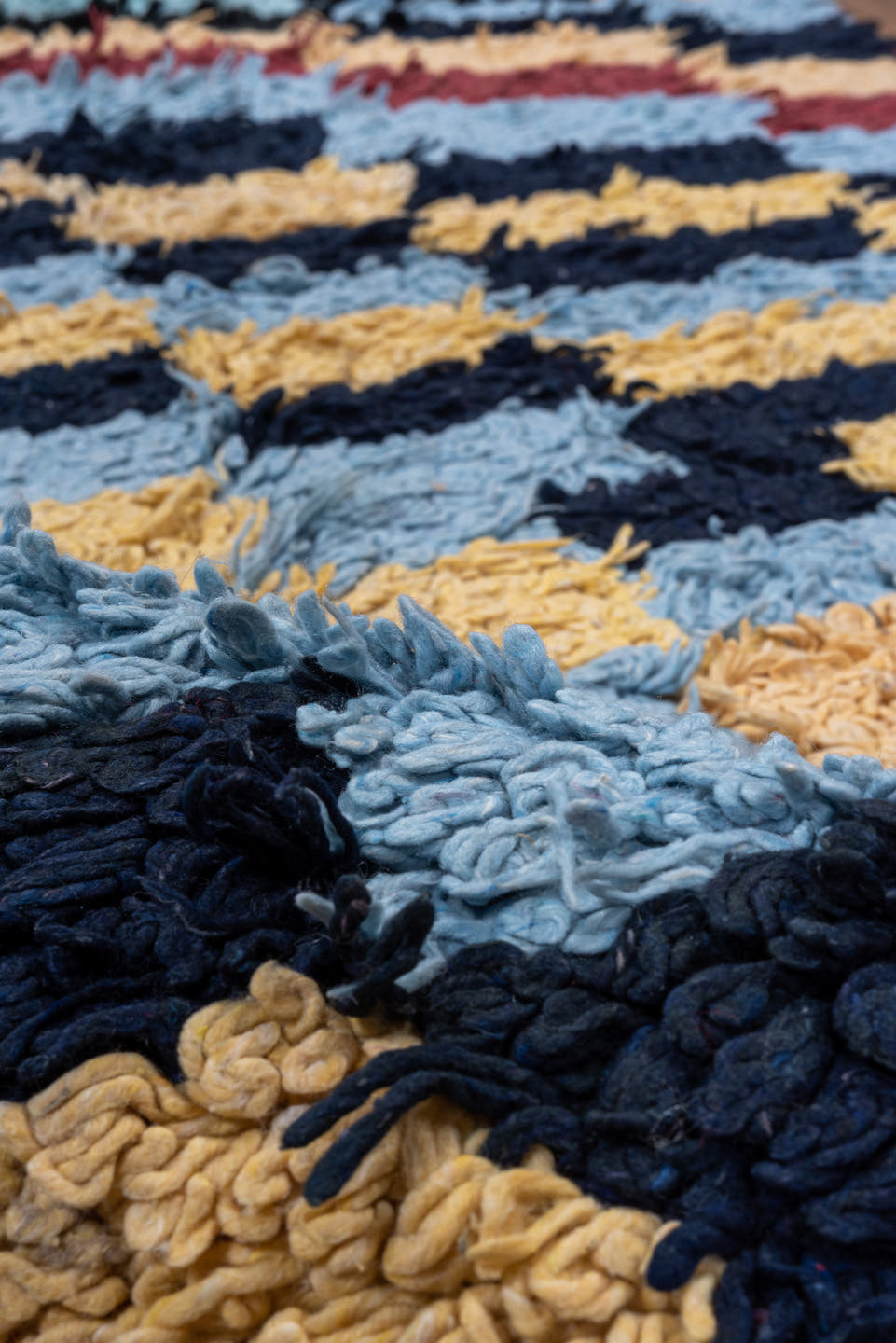 3' x 6' one-of-a-kind handmade vintage Rag Rug runner rug. Color palette: light blue, cream, navy, teal, rust, black, ivory