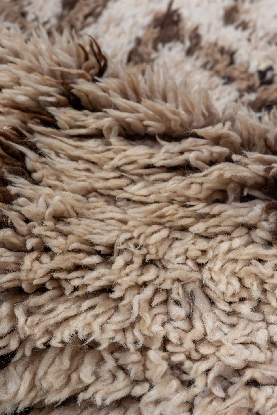 2' x 4' one-of-a-kind handmade vintage Moroccan small size rug. Color palette: ivory, camel, brown, beige