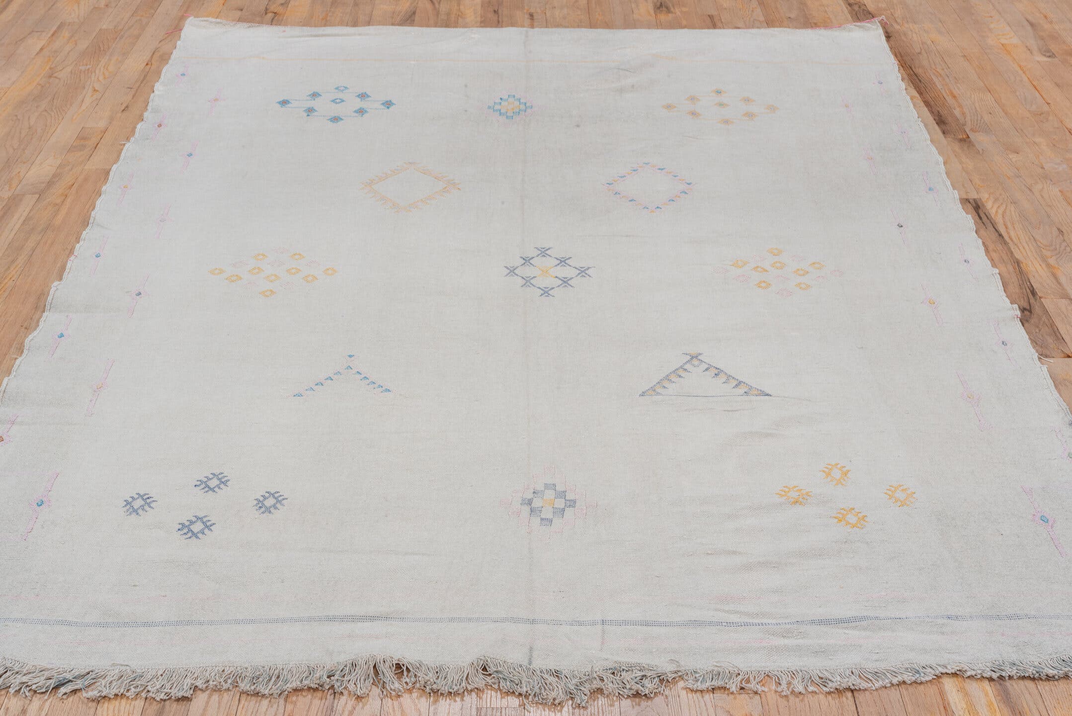5' x 9' one-of-a-kind handmade vintage Cactus Kilim medium size rug. Color palette: ivory, cream, pale blue, gold, blush