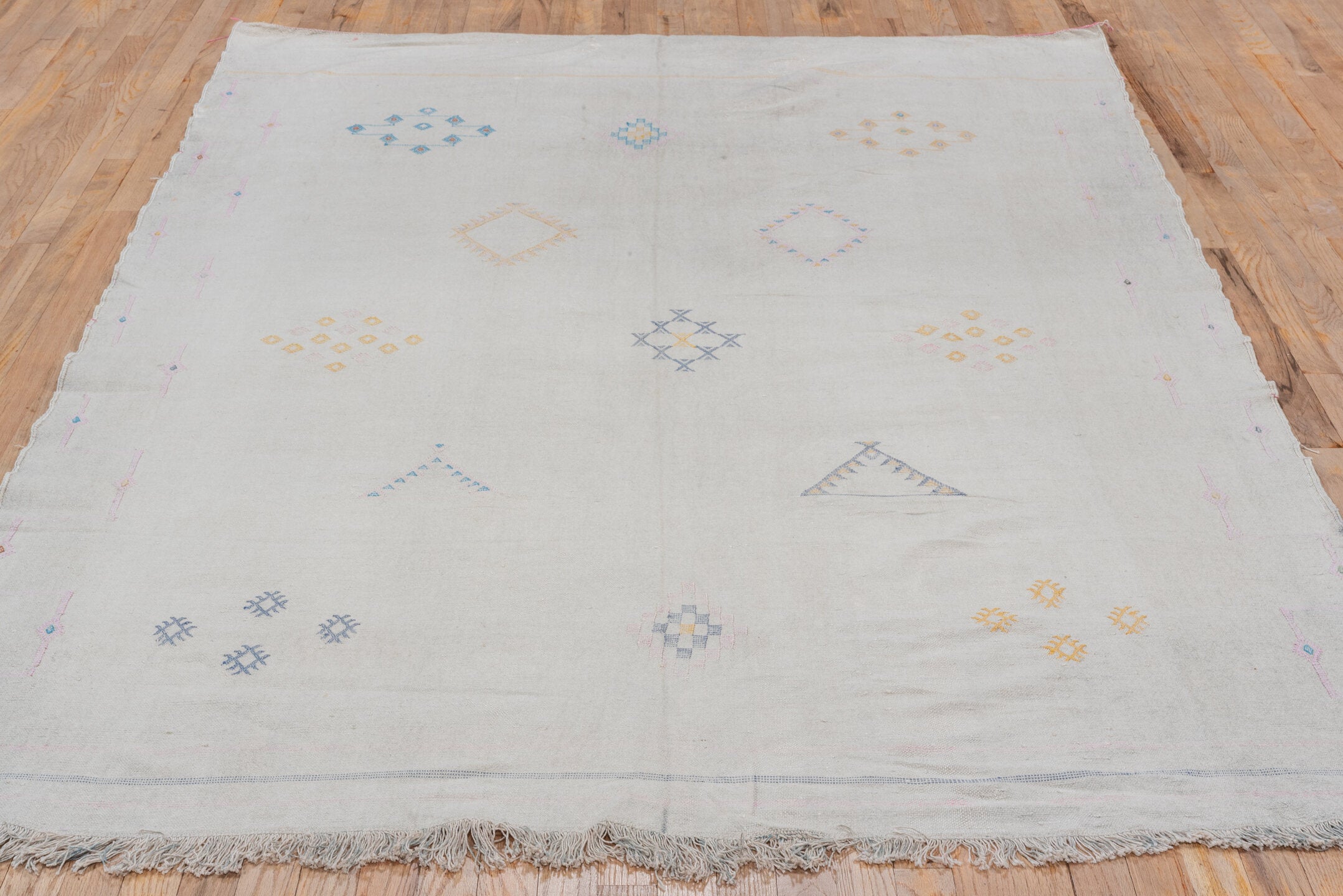 5' x 9' one-of-a-kind handmade vintage Cactus Kilim medium size rug. Color palette: ivory, cream, pale blue, gold, blush