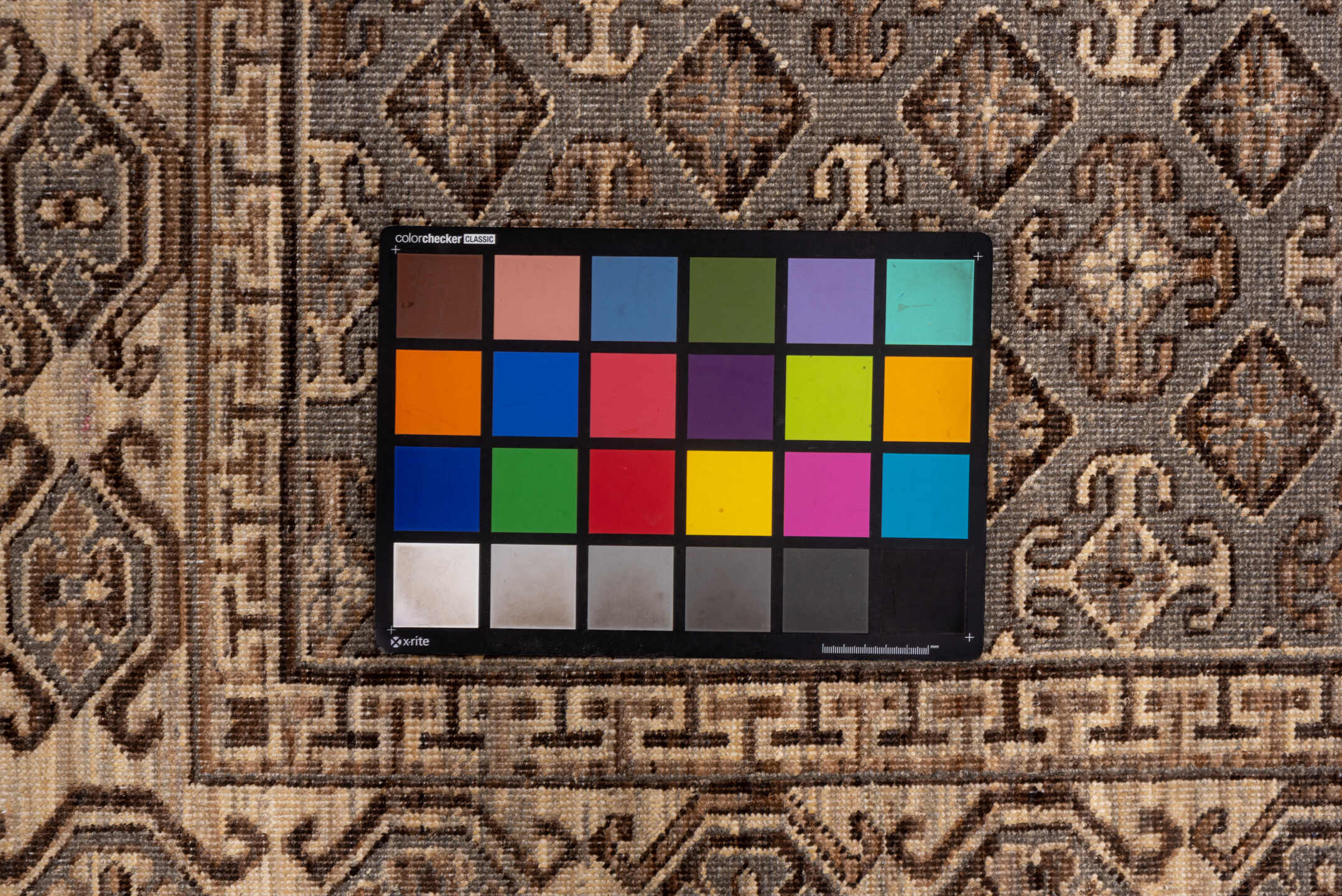 4' x 6' one-of-a-kind handmade vintage Khotan small size rug. Color palette: brown, dark gray, gray, light gray, off-white