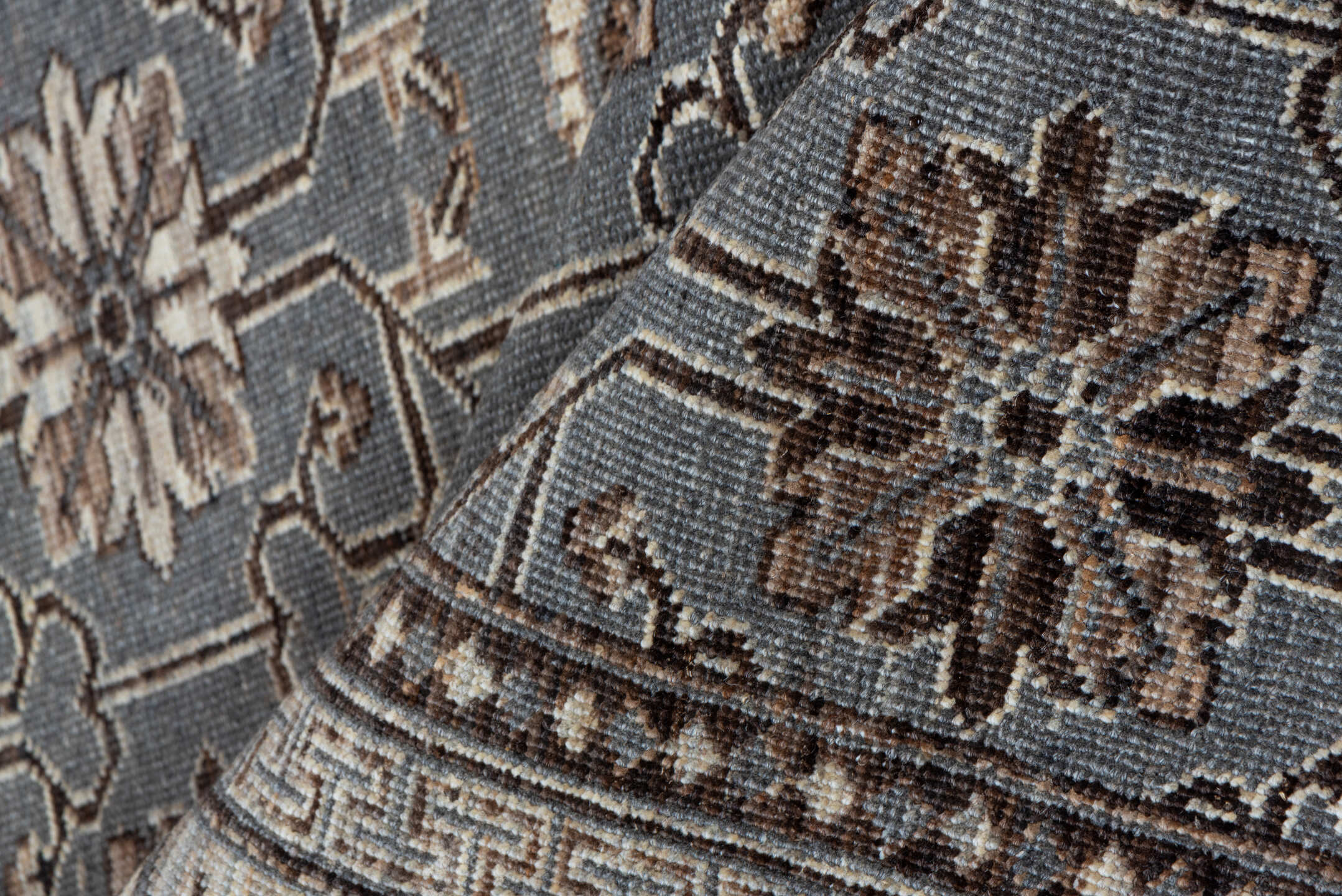 5' x 7' one-of-a-kind handmade vintage Khotan rug. Color palette: brown, dim gray, gray, light gray, off-white, pink