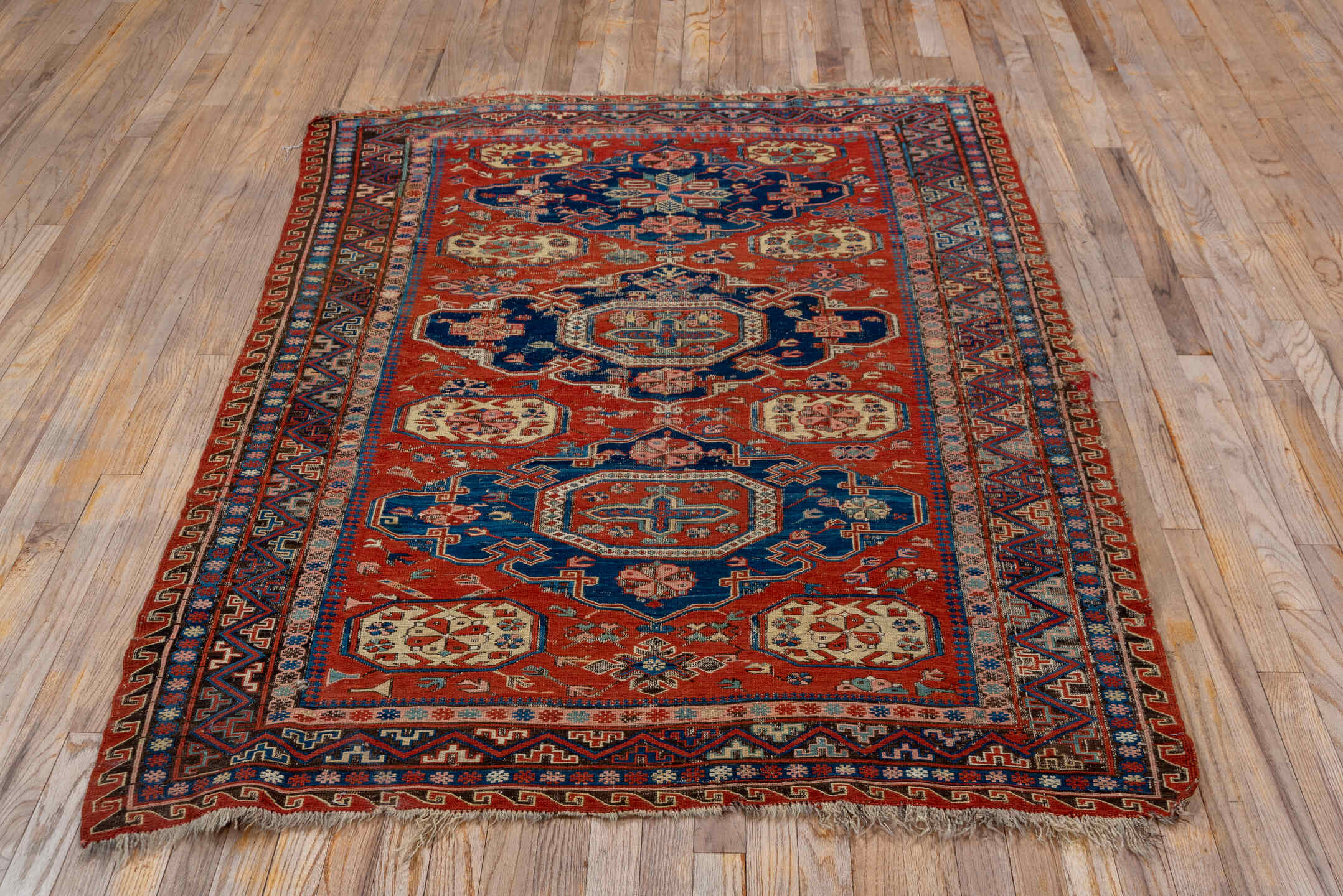 4' x 6' one-of-a-kind handmade vintage Sumak small size rug. Color palette: blue, brown, gray, light gray, pink, red