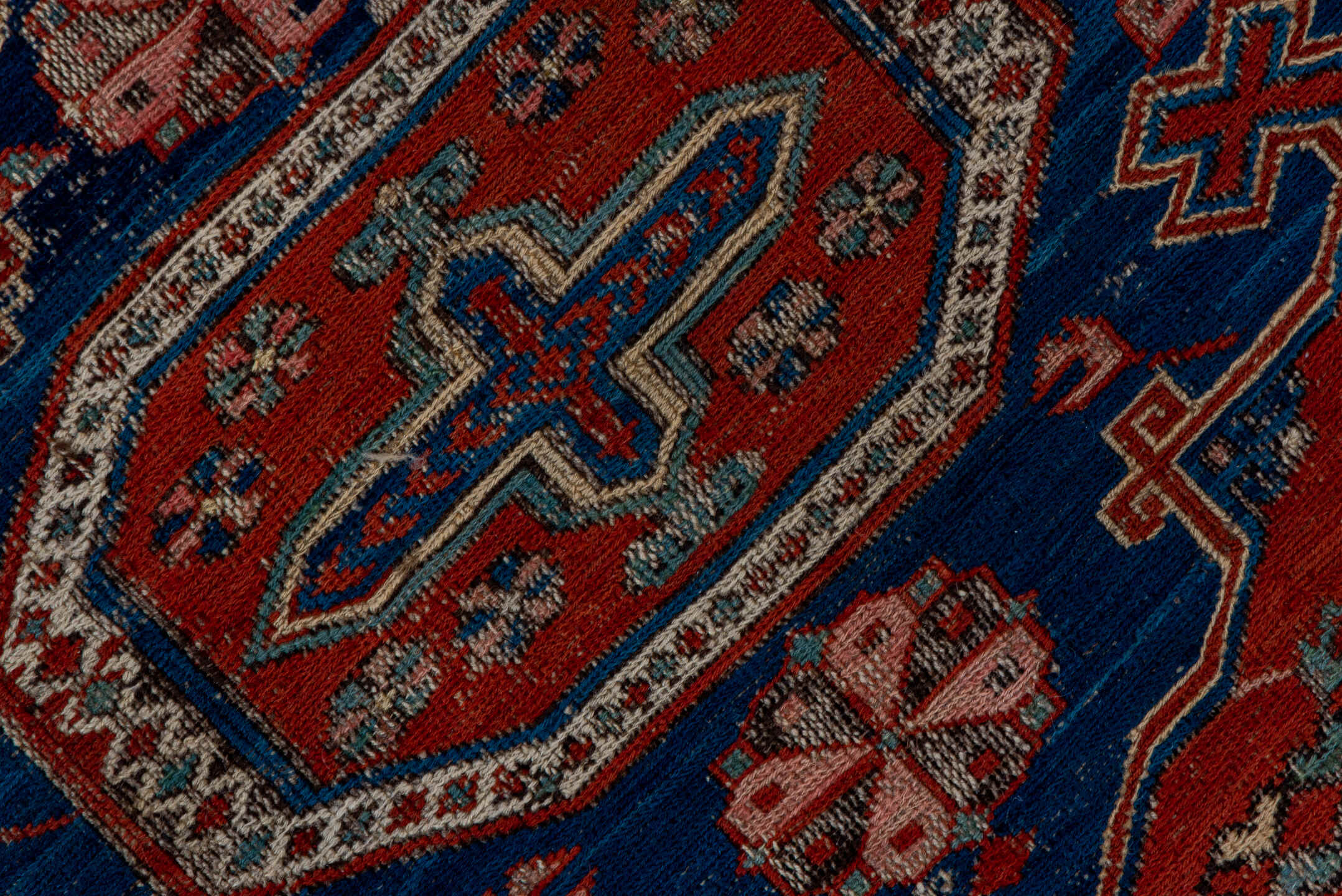 4' x 6' one-of-a-kind handmade vintage Sumak small size rug. Color palette: blue, brown, gray, light gray, pink, red