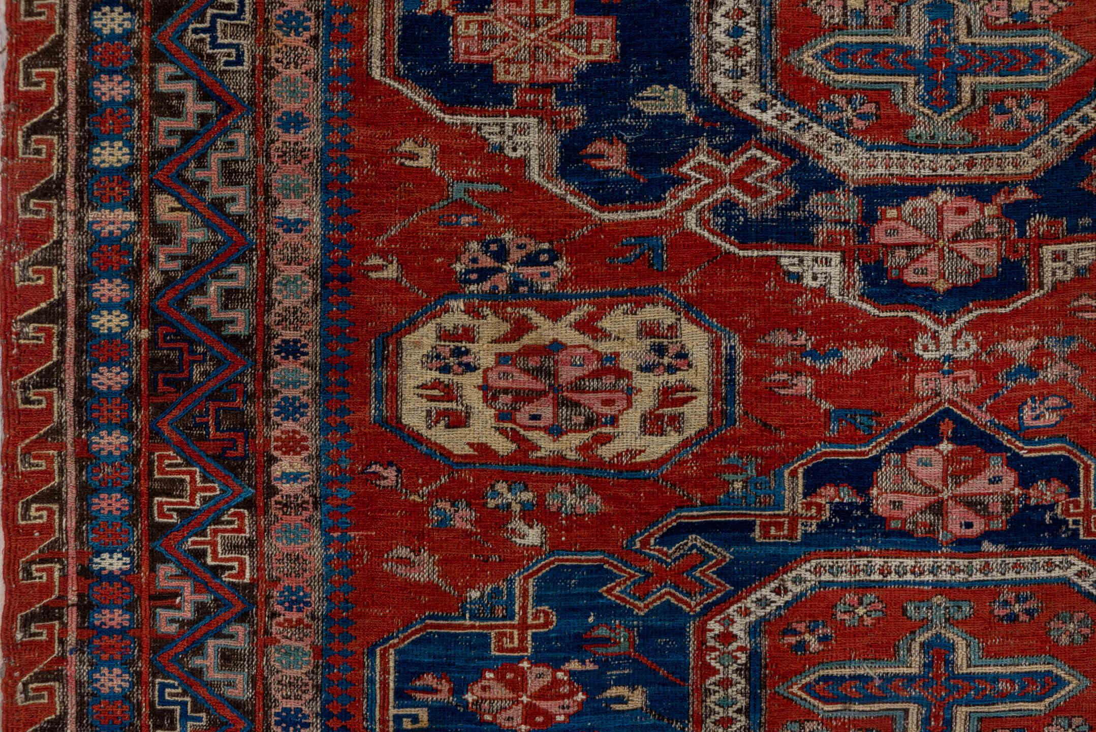 4' x 6' one-of-a-kind handmade vintage Sumak small size rug. Color palette: blue, brown, gray, light gray, pink, red