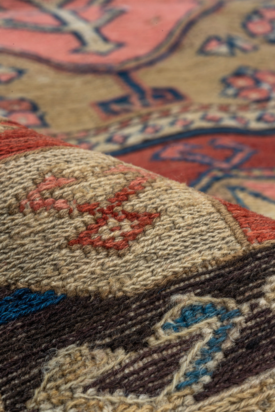 3' x 6' one-of-a-kind handmade antique Sumak small size rug. Color palette: rust, ivory, indigo, camel, charcoal, rose